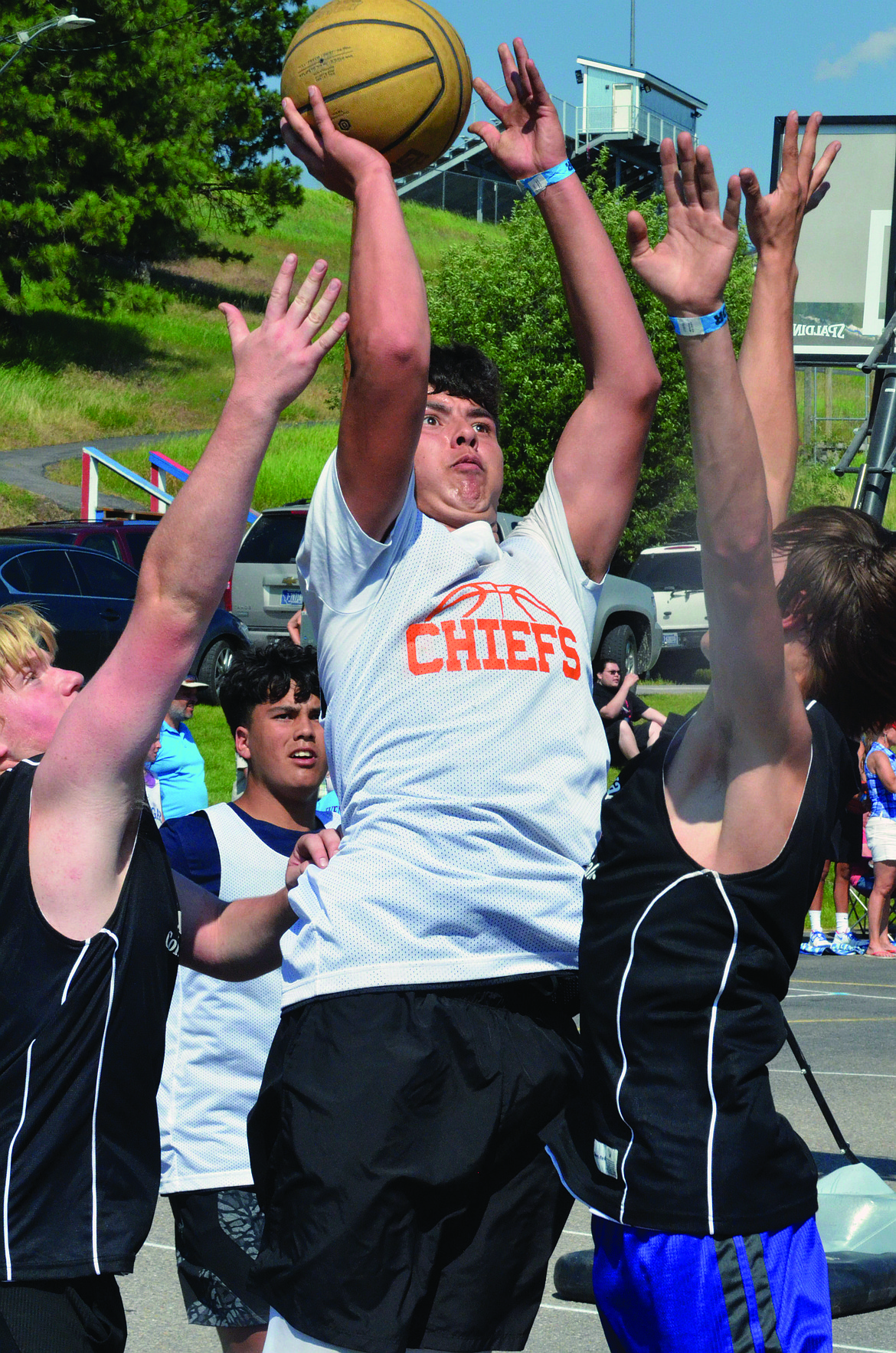 RONAN PLAYER Dallas Durhiem attemps a shot in the 3-on-3 Battle in the Bay 3-on-3 Tournament Saturday afternoon at Bigfork High School. (Photo by Jason Blasco/Lake County Leader)