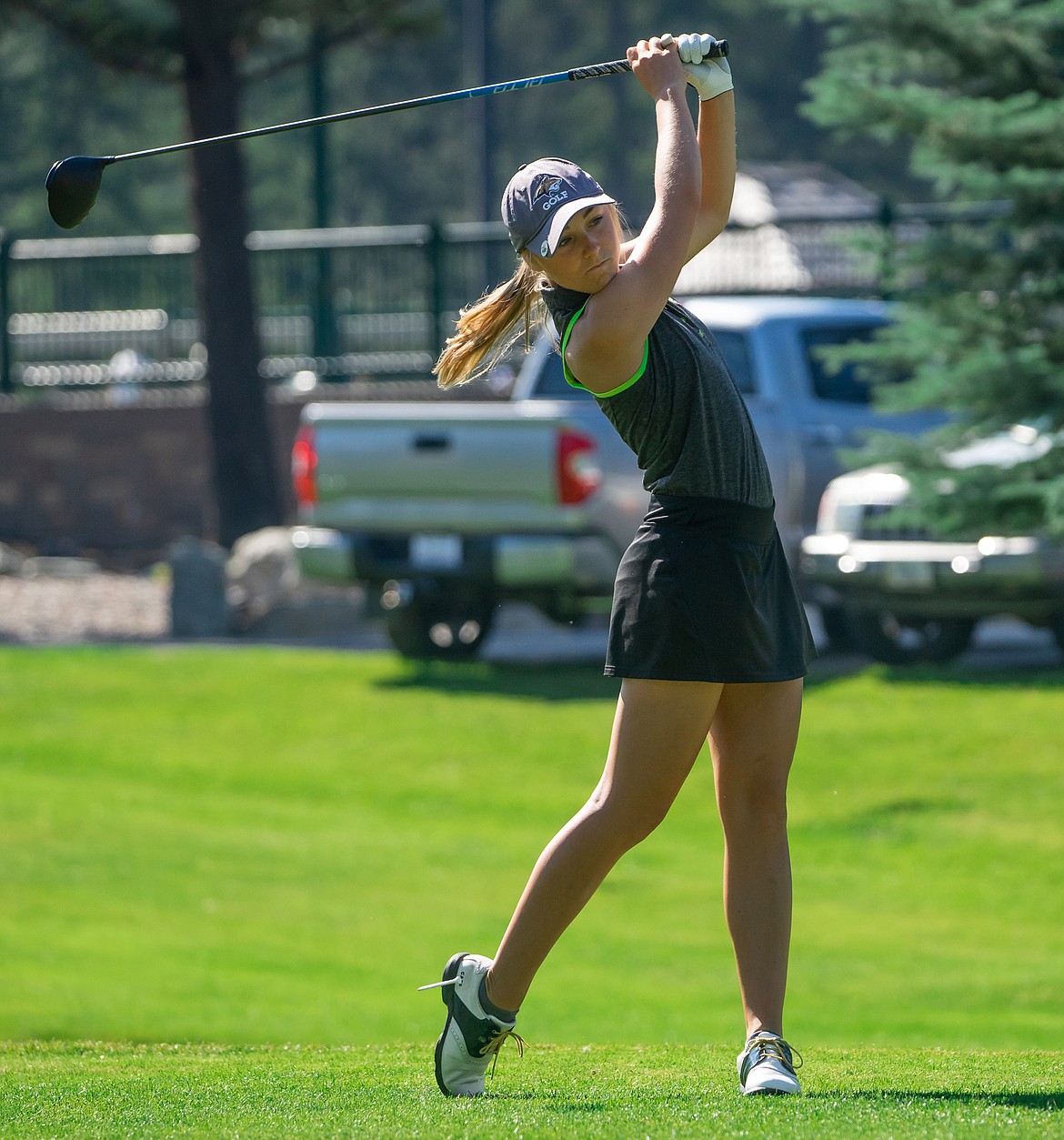 Whitefish's Coral Schulz tees off on round two of the Fourth of July Tournament at Whitefish Lake Golf Course on Friday.