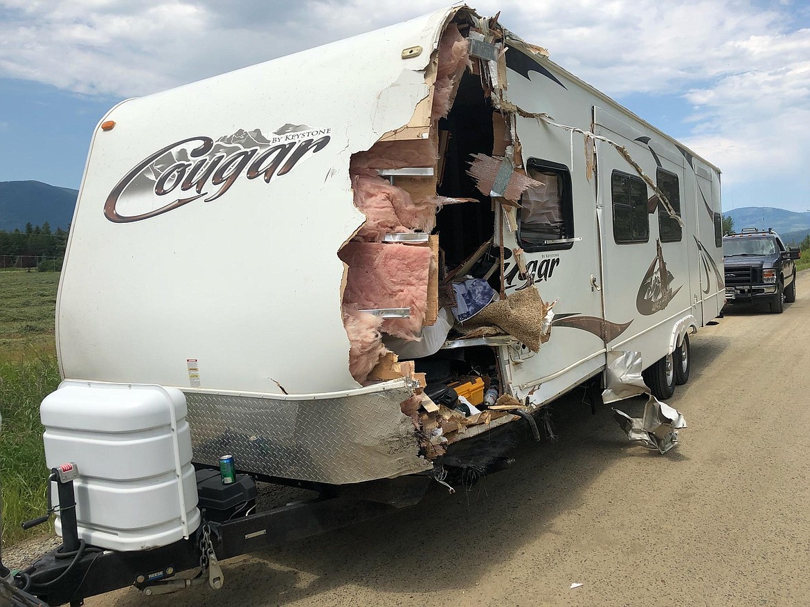 The family of this trailer were very thankful for local members of the community who helped to patch up their trailer and brought them drinks and snacks.