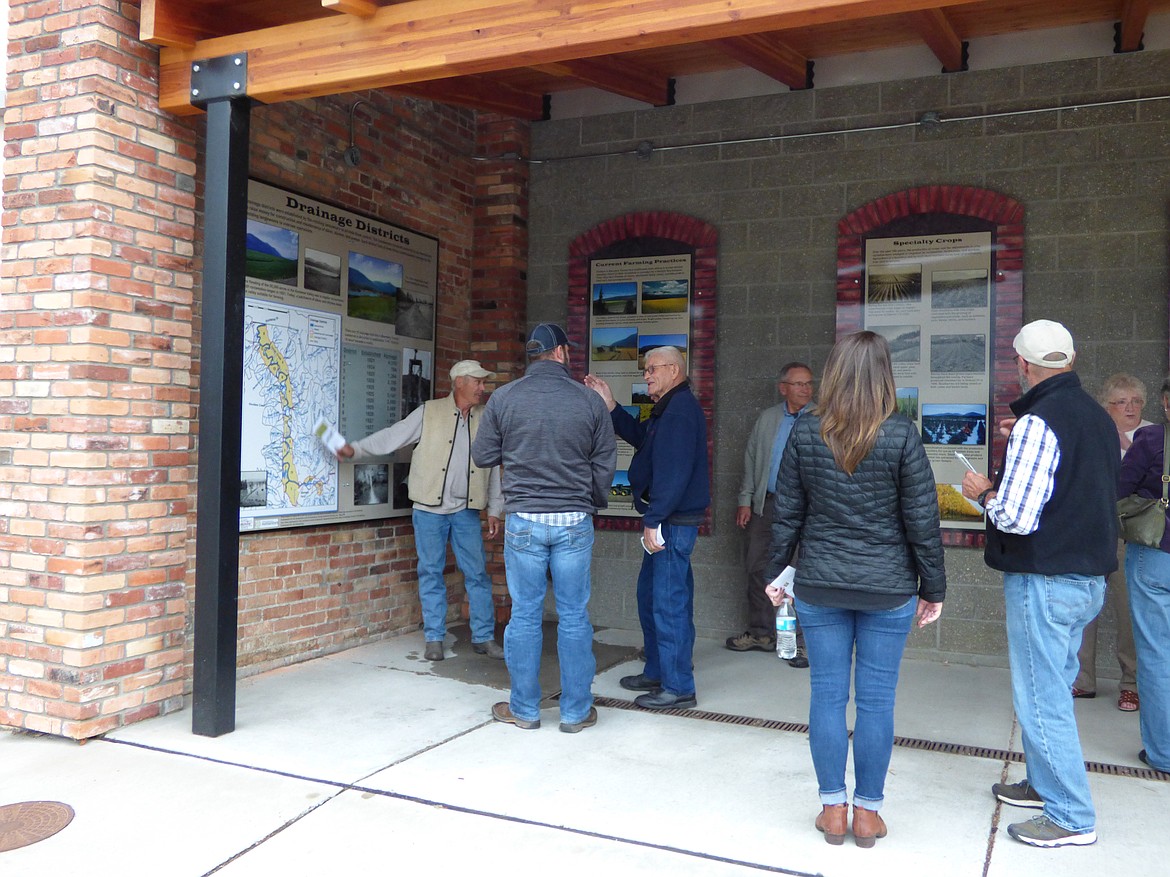 (Courtesy Photo)
Enjoying the panels during the dedication.