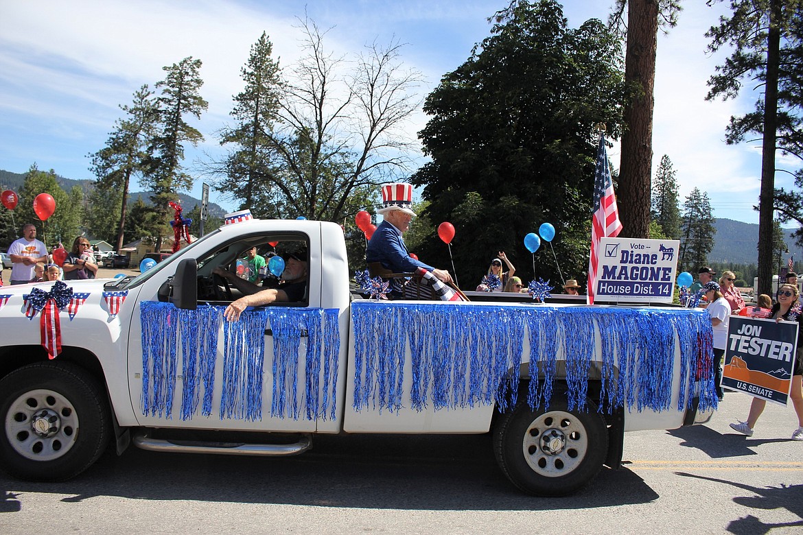 Joe Magone steps in as Uncle Sam to help support the Democratic Party and his daughter, Diane Magone, who is running for House District 14 this year. (Kathleen Woodford/Mineral Indepedent)