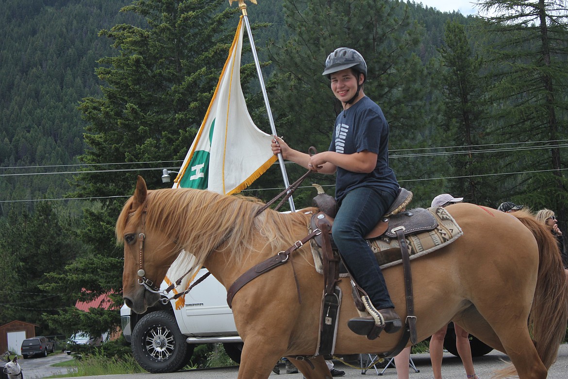 Photo by TANNA YEOUMANS
Austen Jones carried the 4-H flag on his horse Ginger.