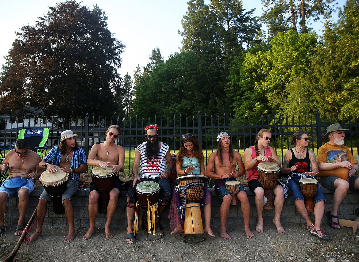 A group of drummers leads hundreds of participants in song Friday evening at SoulShine's Full Moon Gathering 2018 at Sanders Beach. (LOREN BENOIT/Press)