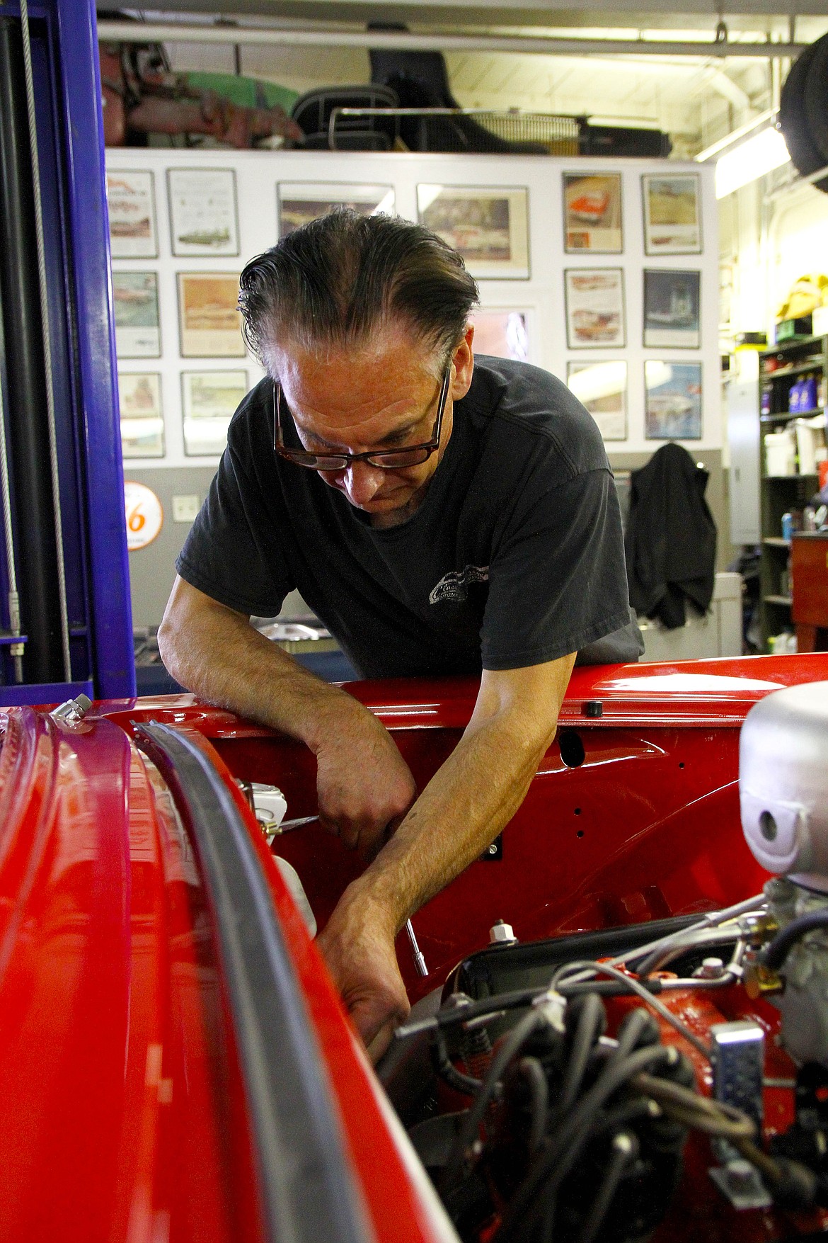 Tim Hein works on an F Bird, referring to this Thunderbird&#146;s factory engine, that the owner intends to use with a supercharged 312 CID engine as a show car rather than drive it around.