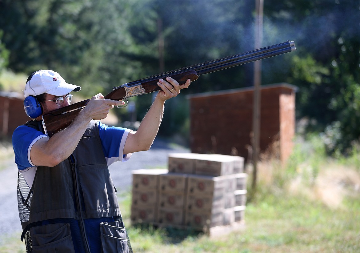 Coeur d'Alene Press reporter Judd Wilson shoots clays while on assignment with the Coeur d'Alene Skeet and Trap Club Wednesday morning at Double Barrel Ranch. (LOREN BENOIT/Press)