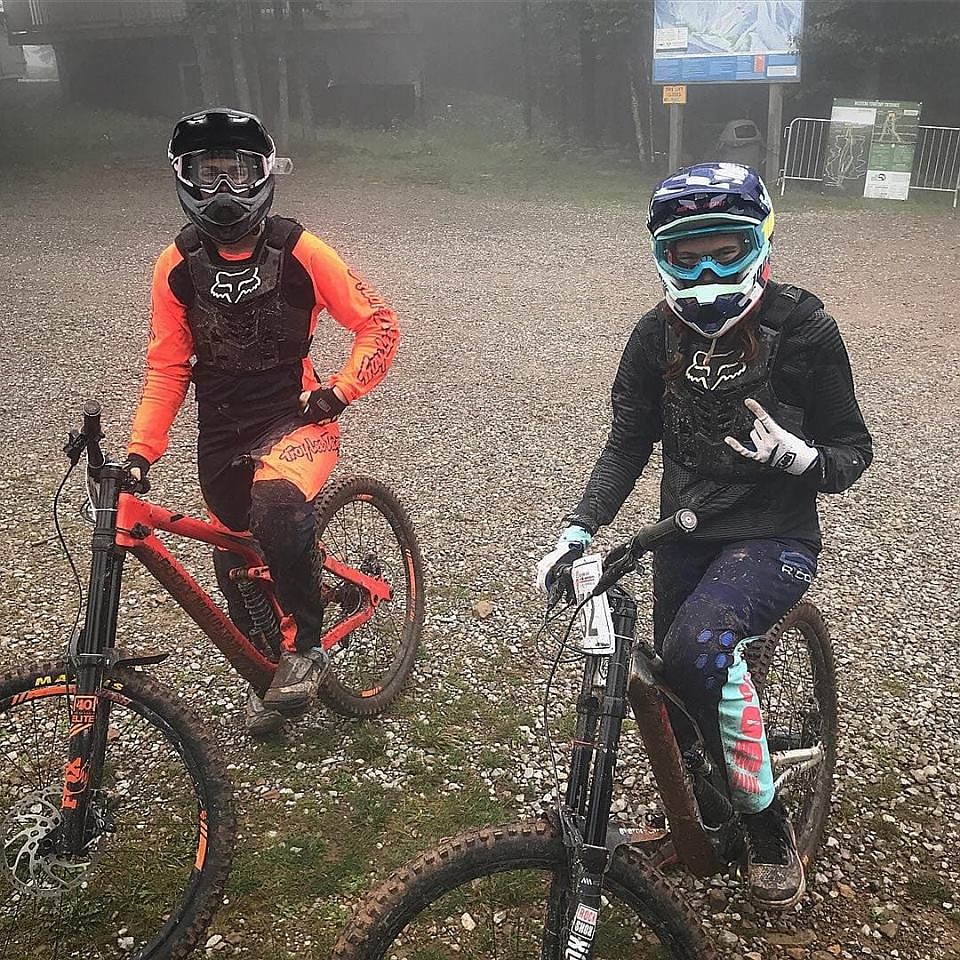 Courtesy photo
Alli Gaertner, 18, left, and Ella Erickson, 15, take a break on the trails of the USA Cycling National Championships in West Virginia last week while preparing for the finals. The North Idaho teens earned second place and first place, respectively, in their age groups for downhill racing.