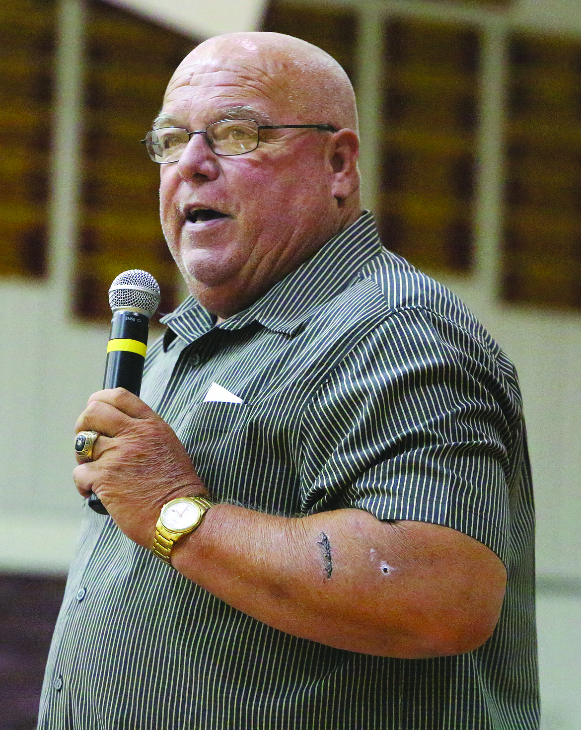 Connor Vanderweyst/Columbia Basin Herald
KBSN sports director Dave Heaverlo speaks during Mel Olson's celebration of life on Thursday.