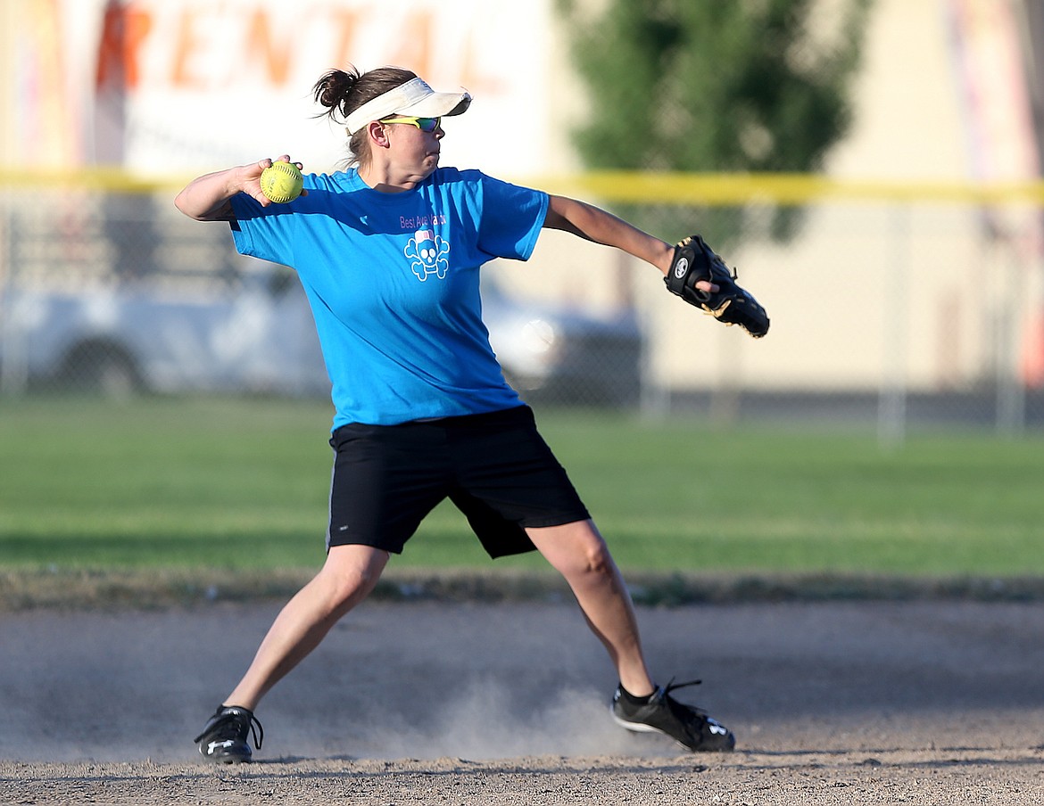Danni Moss of Kootenai Recovery Center throws to second base for the out in a game against Sage Creek Products.