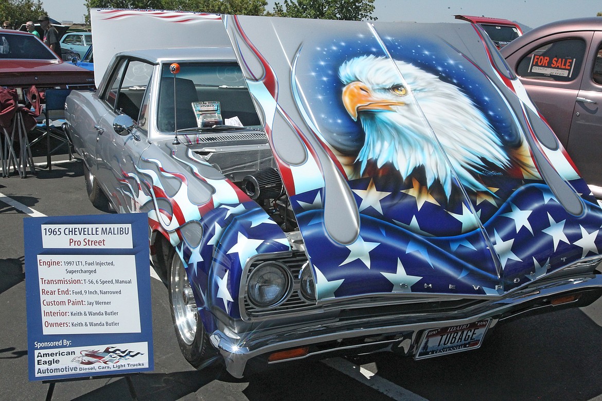 Flames of Old Glory and an American bald eagle decorate this 1965 Chevelle Malibu on display Saturday during the first Rod Run car show, presented by the North Idaho Classics Car Club. The show featured about 200 different vehicles as well as merchant booths, food vendors and fun activities for kids. (DEVIN WEEKS/Press)