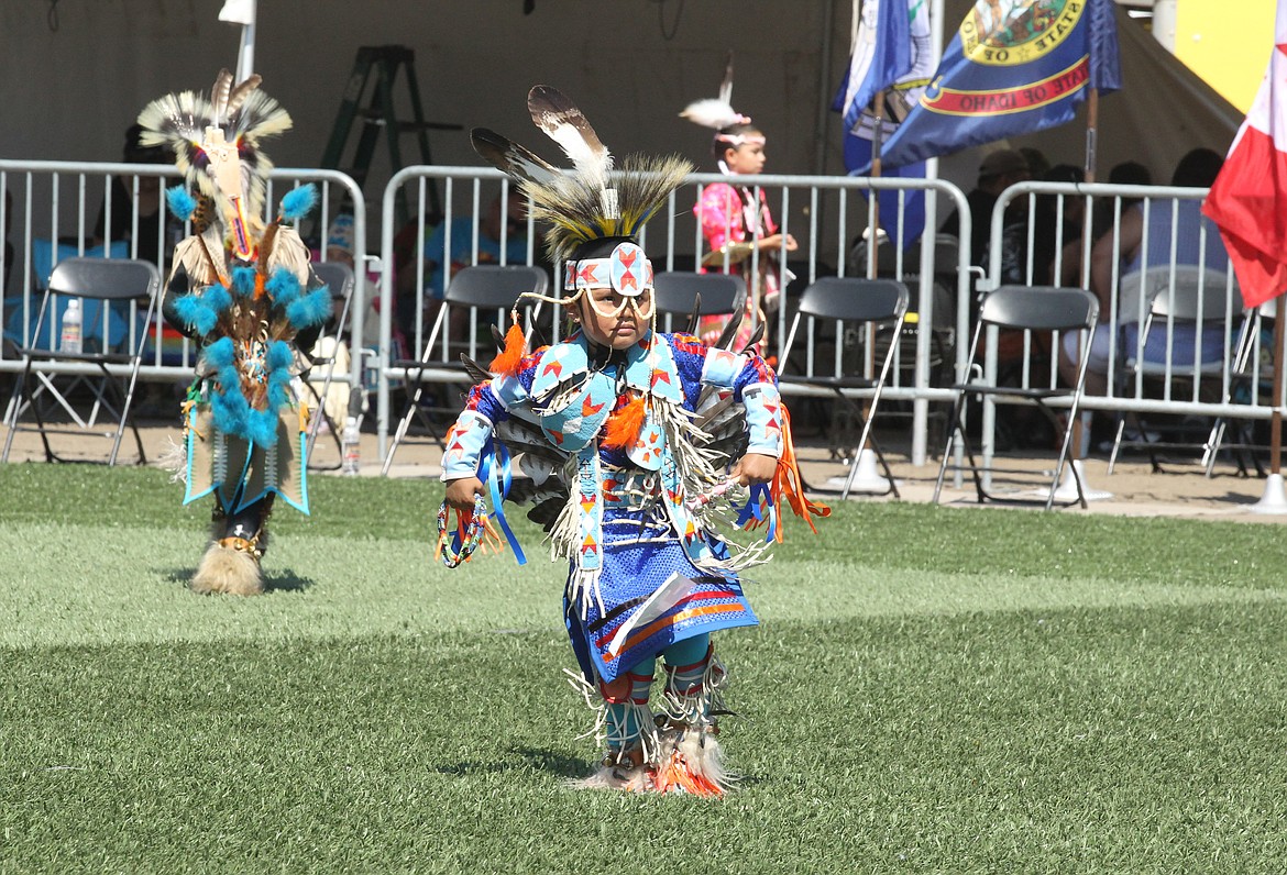 Spokane-Coeur d&#146;Alene Tribal member Sugarbear Hart, 5, dances to drums in traditional regalia Saturday afternoon during the Julyamsh Powwow at the Kootenai County Fairgrounds. The powwow continues today at 1 p.m. (DEVIN WEEKS/Press)