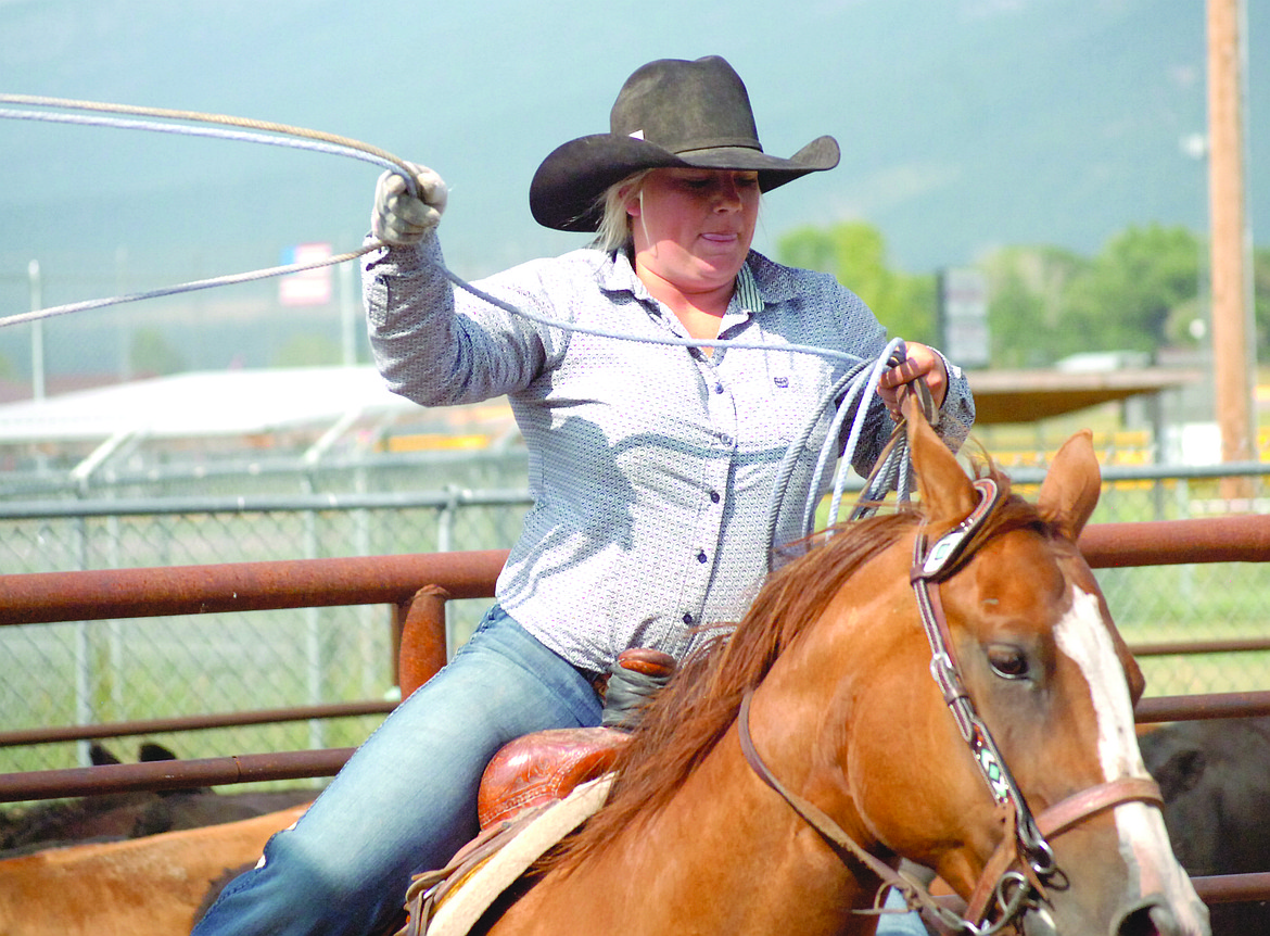 Hallie Sohr swings her loop as she focuses on catching a steer during the Lake County Fair Ranch Rodeo. Her team came in fourth in the competition.