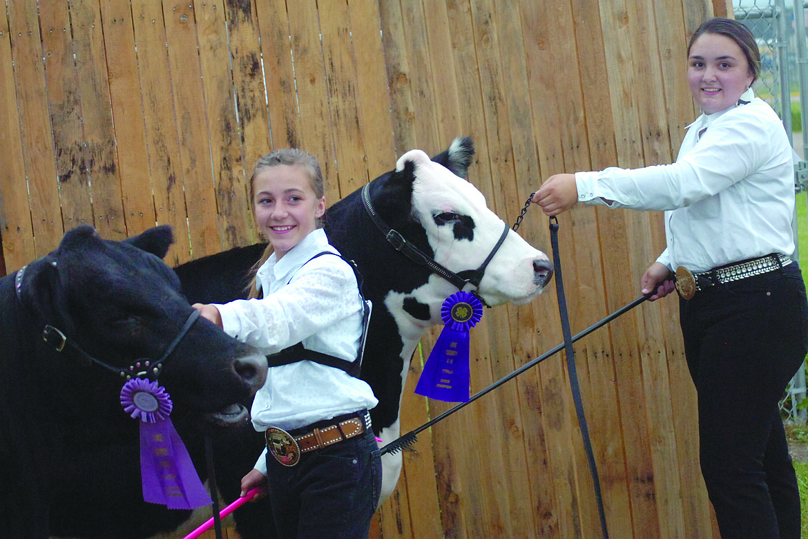 Mission Valley Ranch Hands 4-H Club went 1-2 in Senior Beef Showmanship on Friday, July 27 during the Lake County Fair in Ronan. Kyia Hendrickson, right, showed the grand champion, while Megan Evelo had the reserve champion. Read more about their success in 4-H showmanship in the Aug. 2 issue of the Lake County Leader.