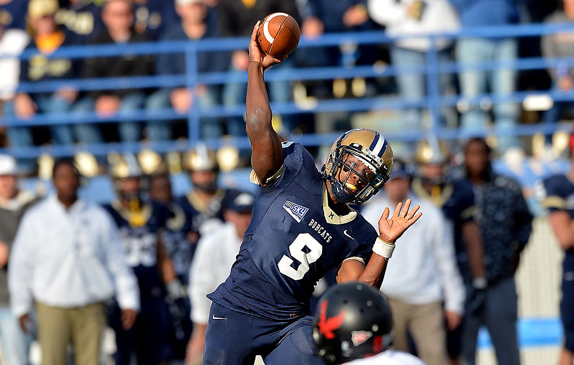 FORMER MONTANA State University quarteback Denarious McGhee attempt to throw a pass. McGhee is one of MSU&#146;s most decorated athletes in the recent history of the Bobcats&#146; football program. He is currently one of the assistant coaches on the MSU football current Bobcats&#146; coach Jeff Choate. The Bobcats will invade the Polson Mission Valley Friday and Saturday. (photo courtesy of Montana State)University.