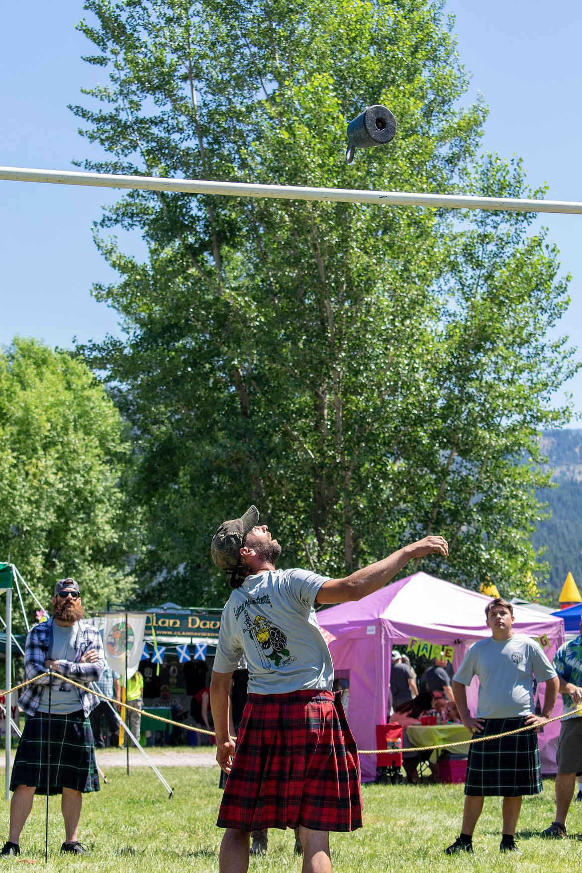 Jeremy Nelson watches the weight he just released clear the bar during the 2018 Kootenai Highlanders Gathering Saturday.