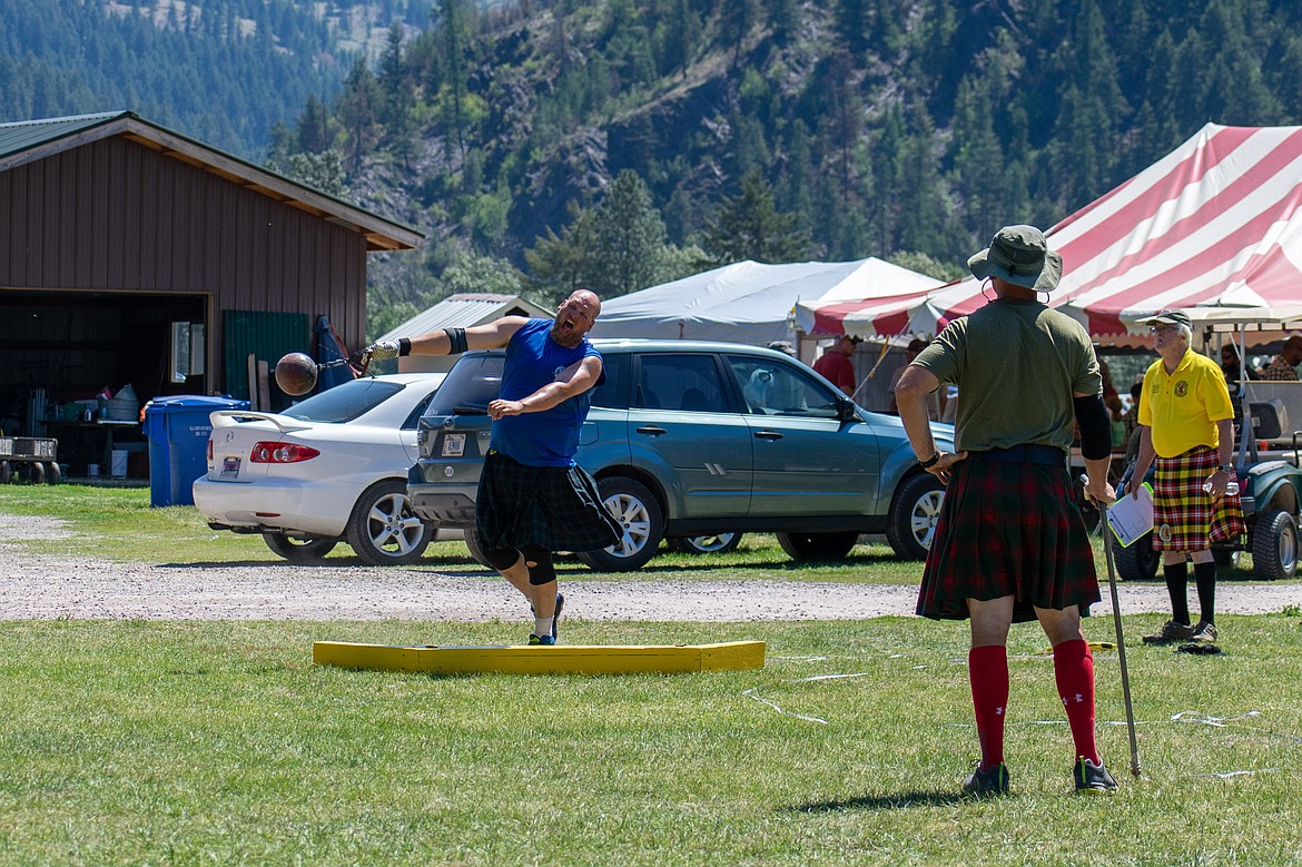 Cody Jessop throws with all his might during the weight toss game at the 2018 Kootenai Highlanders Gathering Saturday.