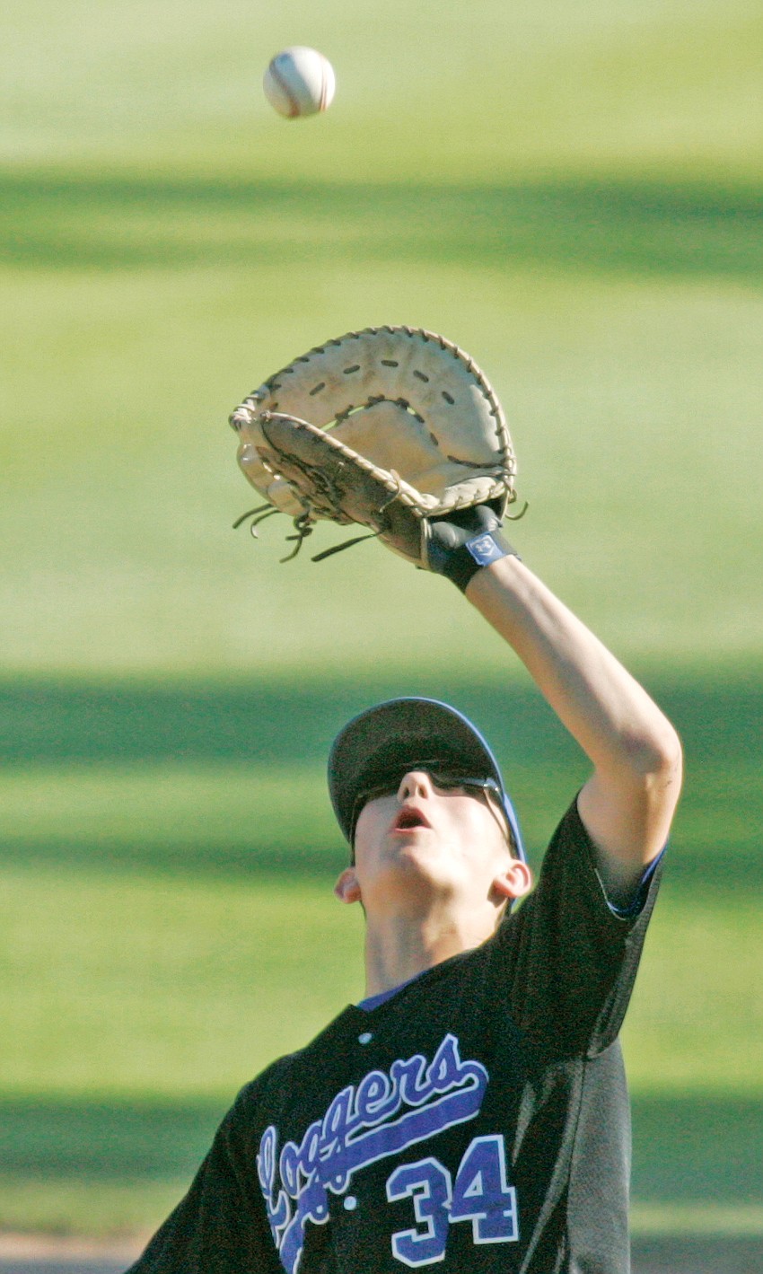 Loggers vs. Mavericks with first baseman Trey Thompson on a pop-up fly for the third out top of seventh inning. Loggers over Mavericks 3-2 in 10 innings in the first of a doubleheader Friday. (Paul Sievers/The Western News)