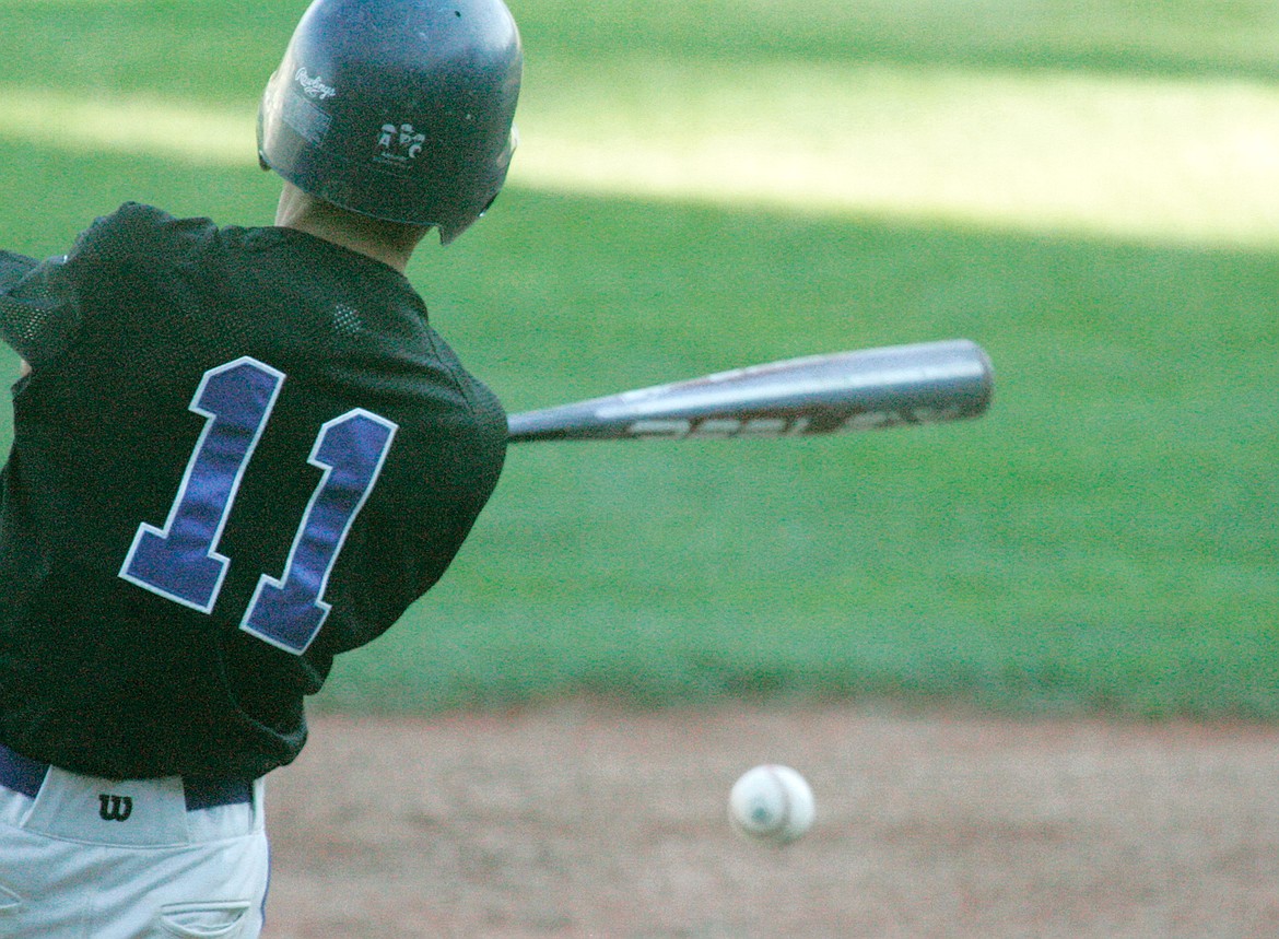 Jeff Offenbecher&#146;s base hit in the bottom of the 10th inning scores Shayne Walker to win the first of a doubleheader, 3-2, over the Mavericks on Friday. (Paul Sievers/The Western News)