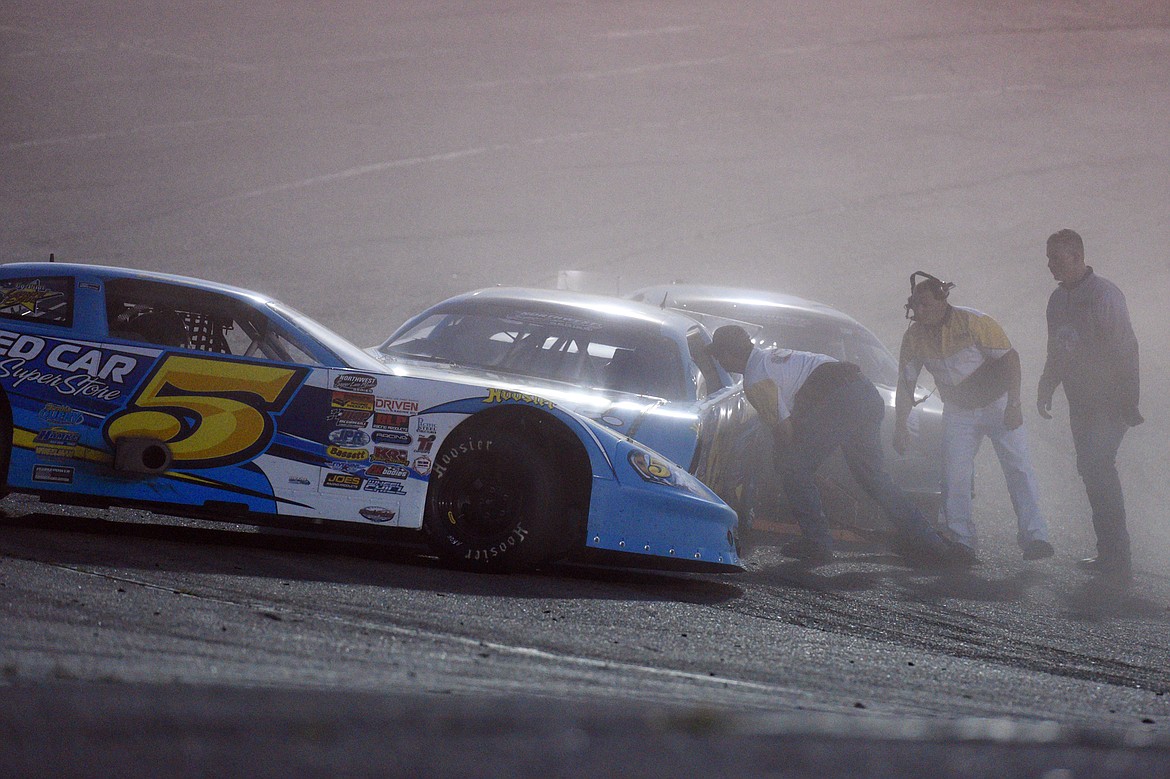 Jan Evans (5), Garrett Evans (64) and Brandt Brown (36) are involved in an early wreck in the Montana 200 at Montana Raceway Park on Saturday night. (Casey Kreider/Daily Inter Lake)