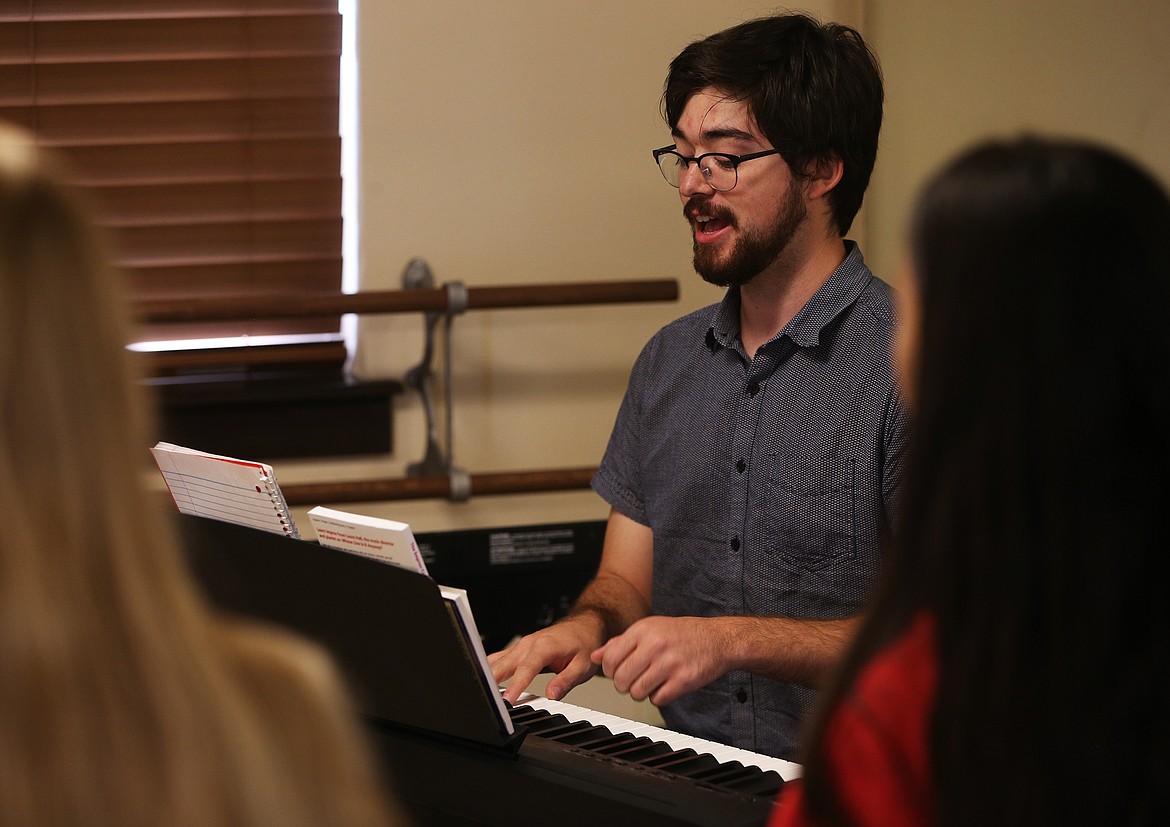 LOREN BENOIT/Press
Presley DuPuis leads campers in an improv song Wednesday afternoon at Expressions in Post Falls.