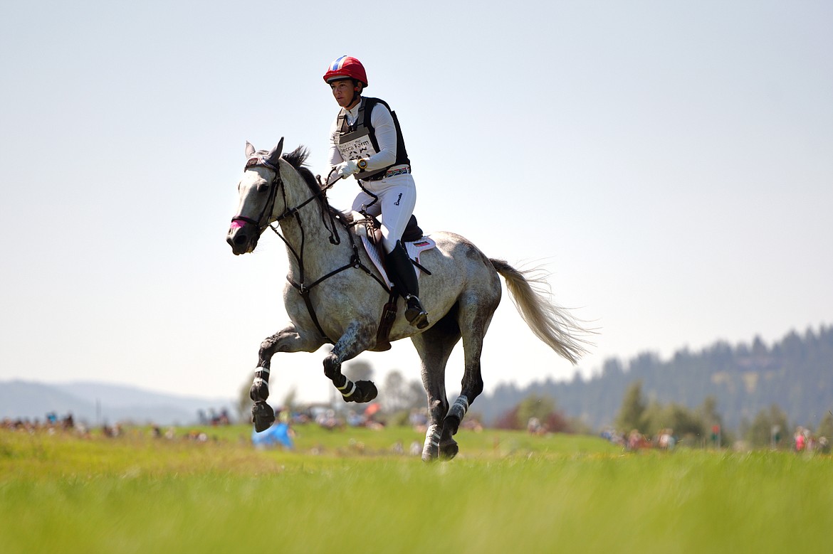 Tamra Smith on horse Fleeceworks Royal rides along an open stretch of the cross-country course during The Event at Rebecca Farm on Saturday. (Casey Kreider/Daily Inter Lake)