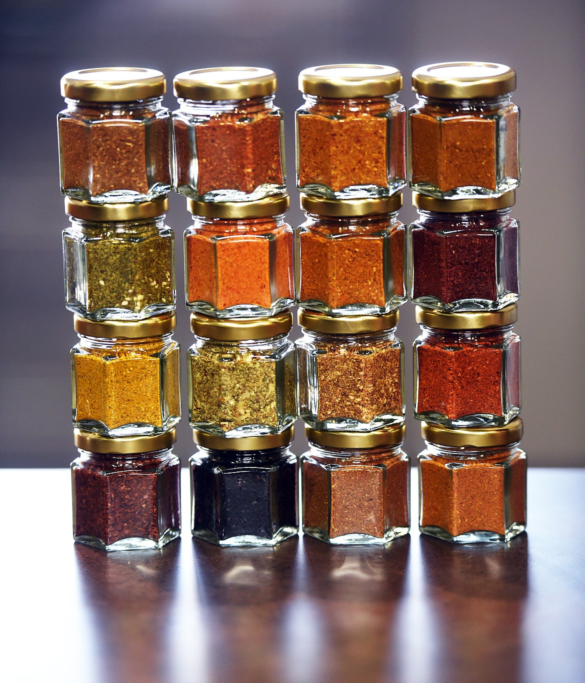 A vfew of the back of the Flavor Companion pack at World Spice Merchants shows the colorful diversity of the spices.(Brenda Ahearn/Daily Inter Lake)