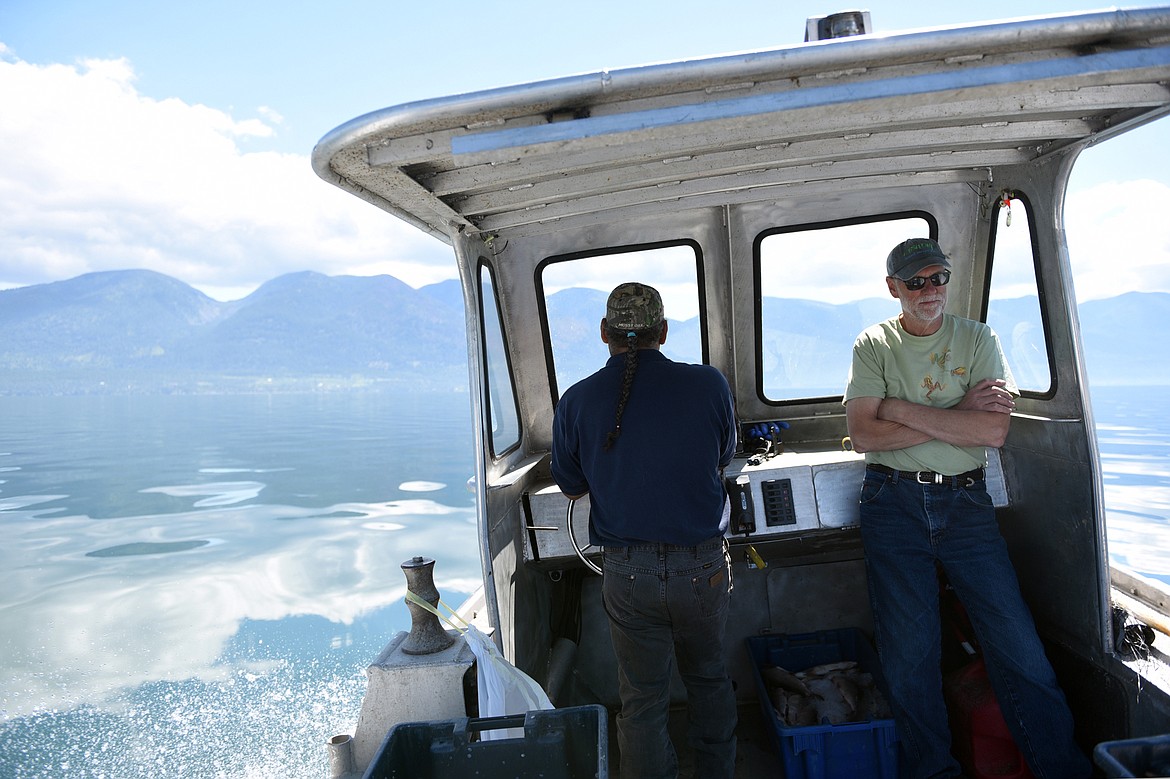 Joe Santos, left, and Barry Hansen, a tribal fisheries biologist with the Confederated Salish &amp; Kootenai Tribes, head out onto Flathead Lake during a Native Fish Keepers netting operation on June 20. (Casey Kreider/Daily Inter Lake)