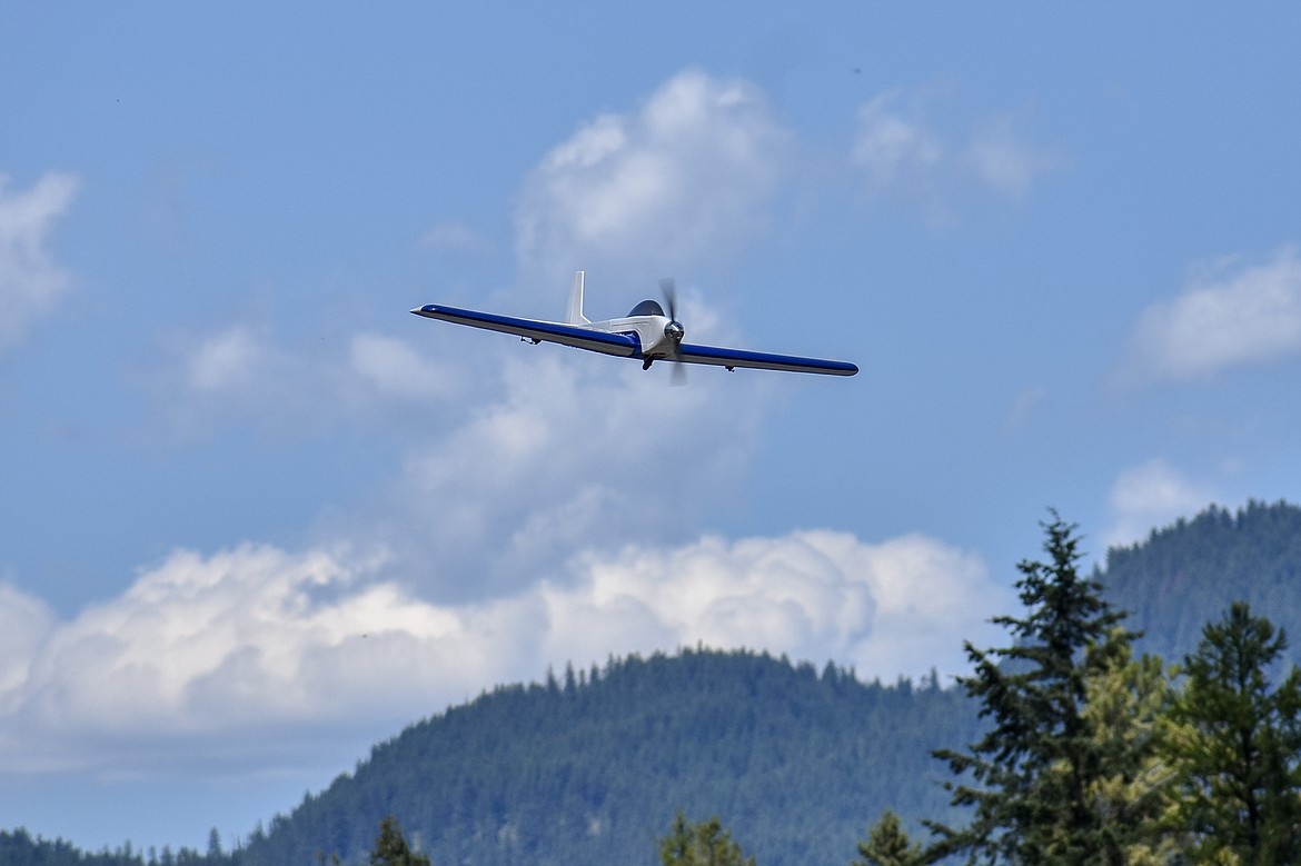 Norm Crum&#146;s sport plane buzzes the runway at the Libby RC airport during the Kootenai RC Flyers Fun Fly July 14. (Ben Kibbey/The Western News)