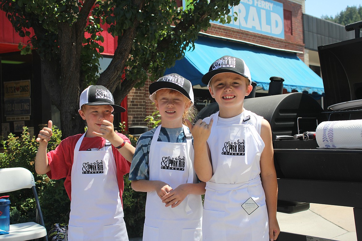 Photo by TANNA YEOUMANS
Cole and Constance Allen, accompanied by Ezekiel Cornett are up and coming chefs in the making, as they helped David Allen in the Wild Game/Ribs cookoff.