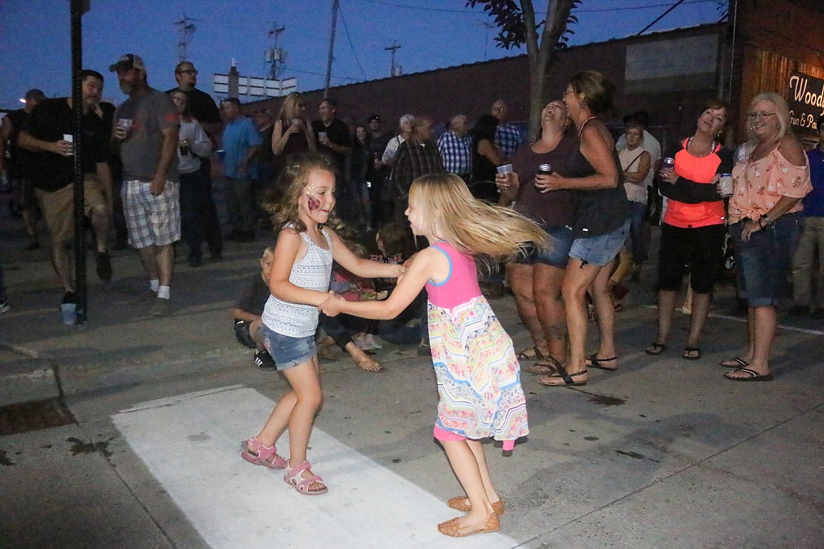 Photo by MANDI BATEMAN
Children took to the street to dance.