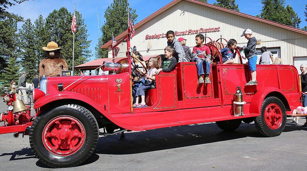 The 1929 GMC fire engine was one of the main attractions at the annual pancake breakfast, July 4 in Seeley Lake. Photo by Nathan Bourne. (Courtesy Seeley Swan Pathfinder)