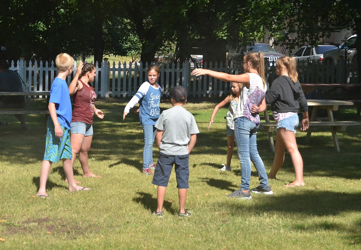 A group of kids play some games while the chicken cooks during the Chicken Jamboree in Thompson Falls.