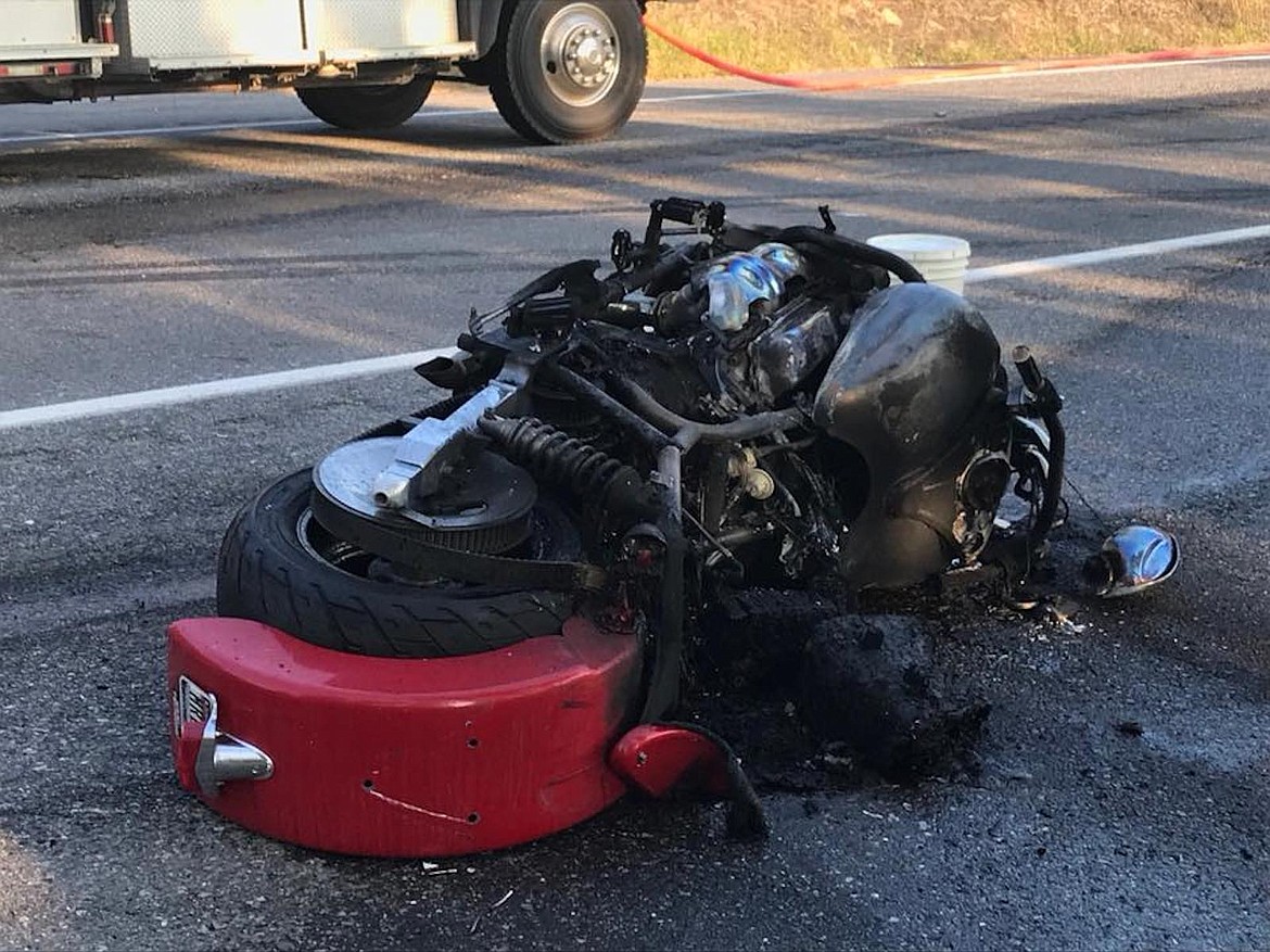 (Photo courtesy SELKIRK FIRE RESCUE &amp; EMS)
The motorcycle and vehicle caught fire, which touched off a brush fire that was brought under control by firefighters.