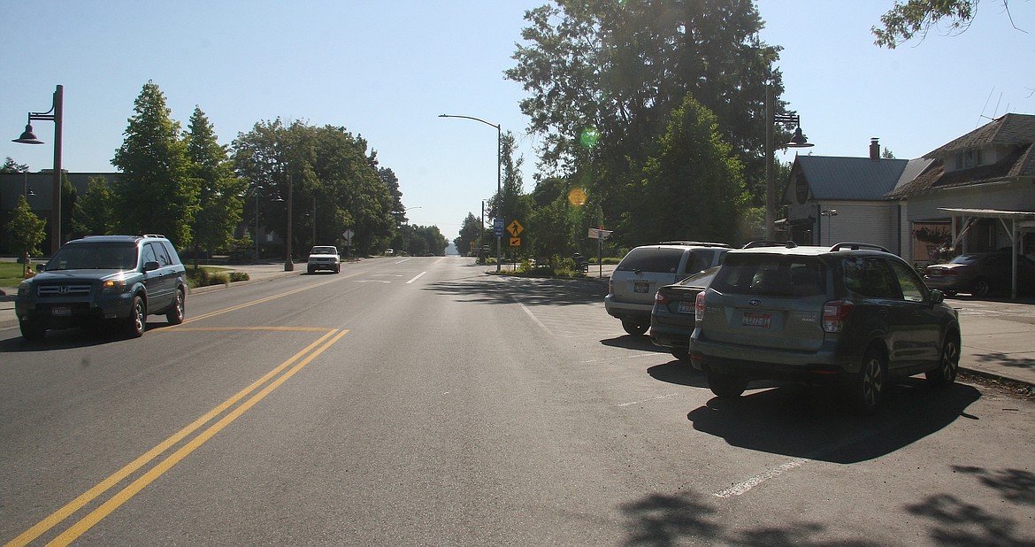 Post Falls is seeking input on a parking plan for the city center. An 
open house will be on Aug. 2 at Q'emiln Park from 4:30 to 7 p.m. This photo 
shows existing angle parking on Fourth Avenue. (BRIAN WALKER/Press)