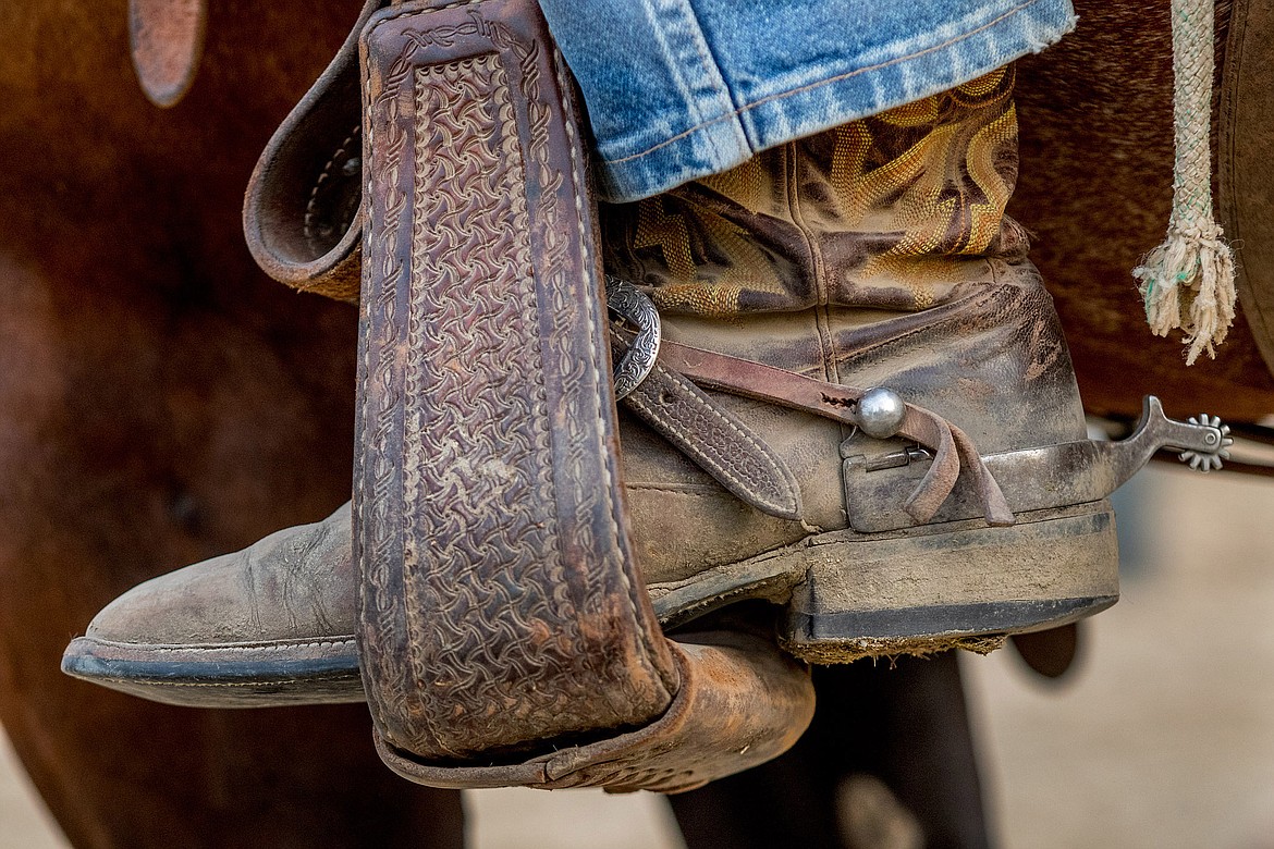 A rider watches the Kootenai Stampede PRCA Rodeo while sitting on his horse Friday at J. Neils Park in Libby. (John Blodgett/The Western News)