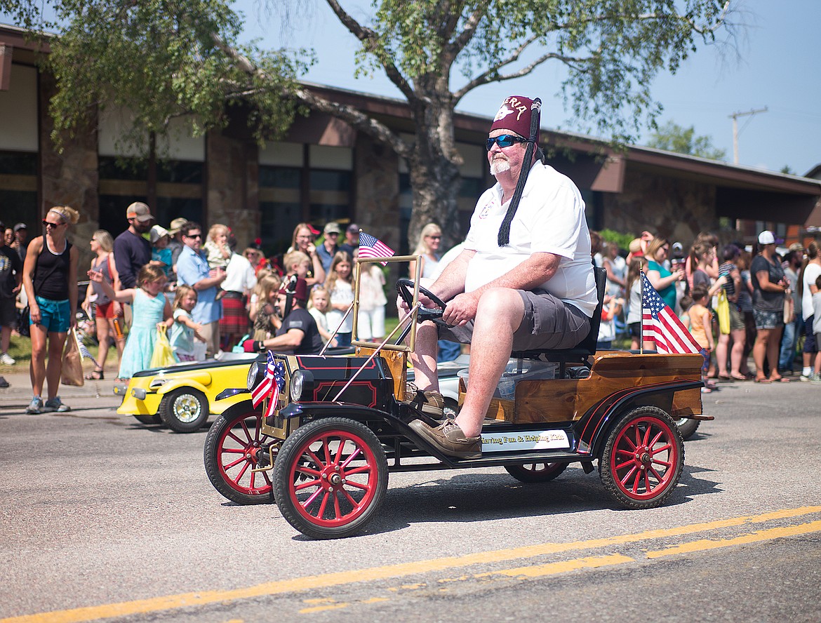 The Shriners ride in the parade.