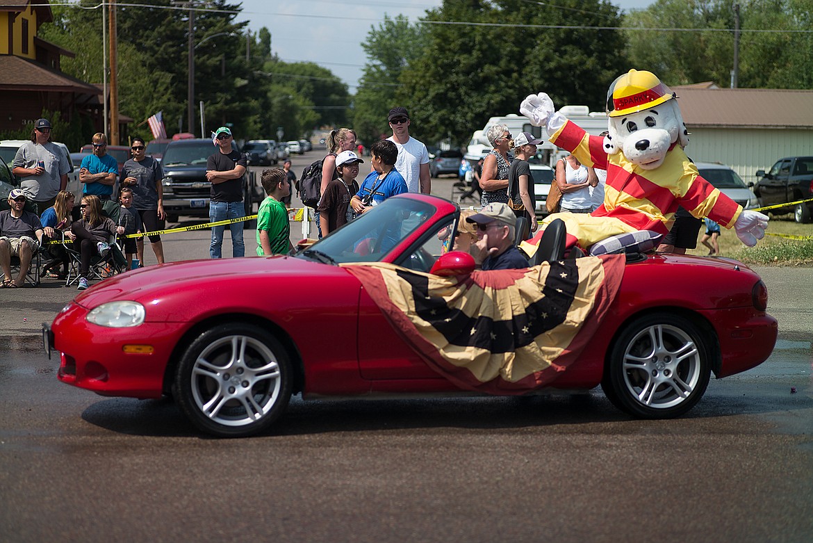 Sparky the fire dog wraps up the parade.