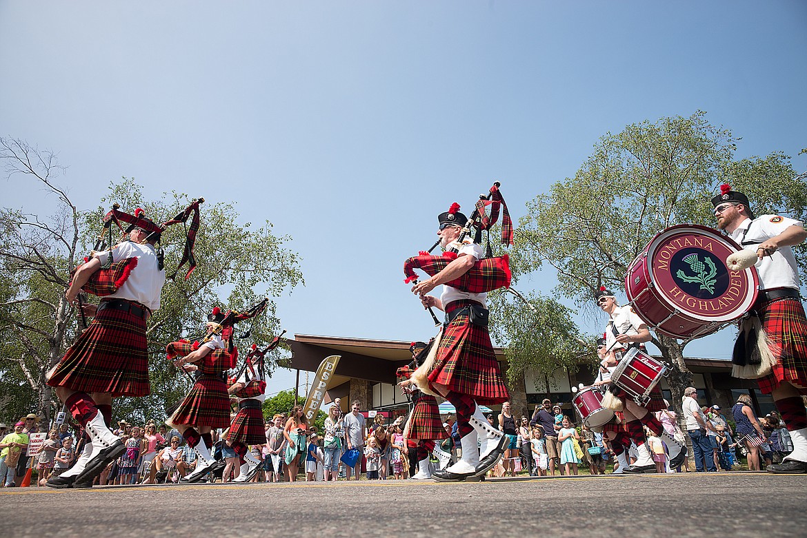 The Montana Highlander march in the parade.