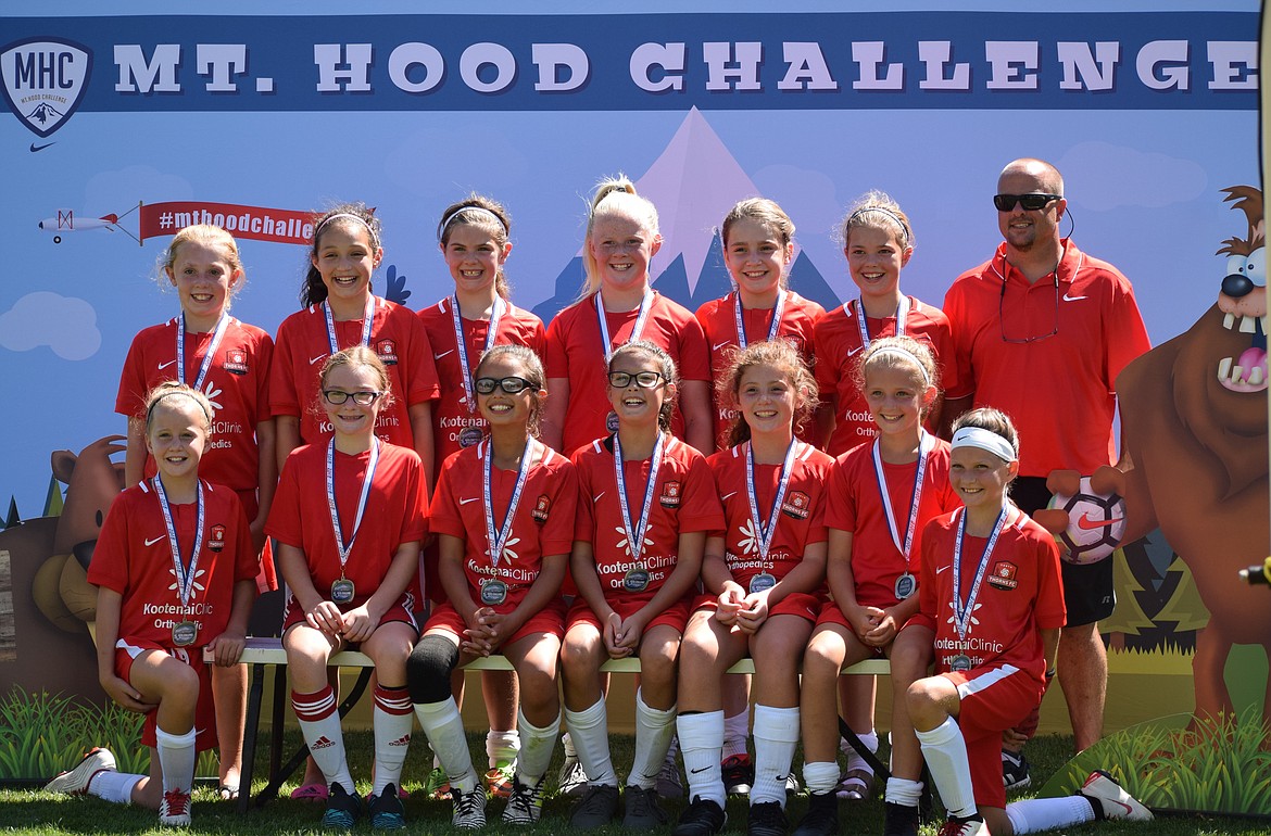 Courtesy photo
The Thorns North 07 girls team finished second at the Mt. Hood Challenge this past weekend. The girls started the tournament off with a big 6-2 win against BFCT Red. Then suffered an 0-2 loss against THELO United. They went on to win 4-1 against WT Copa and in the final pool play game beat HSC Bayern Red 2-1 to advance to the finals. They battled THELO United again, and in tough game came up short with a 2-1 loss. In the back row, from left, are: Kyndall Dolin, Annabelle Rogers, Libby Morrisroe, Kennedy Hartzell, Sofia Peressini, Rachel Corette and coach Kirk Hartzell. In the front are: Lily Bole, Paige Hunt, Isabel Morisette, Ellie McGowan, Evelyn Bowie, Natalie Thompson, and Riley Brazle. Not pictured is Lydia Lehosit.