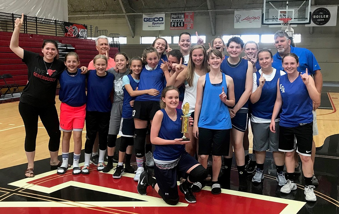 Courtesy photo
The annual NBC Girls team basketball camp was held at Whitworth College in Spokane July 9-12. Teams came from Montana, Washington, Idaho, Canada and Alaska. North Idaho Christian School was the team camp champion with a record of 17-1. In the back row, from left, are: Coach Jerry Bittner, Gracie Gwin, Imelda Bresee, Hailey Jo Parks, Courtney Monaghan, and coach Mike Anderson. In the front are: coach Jenny Lassan, Kadee Greif, Lilly Frades, Alli Whiteman, Jennifer Peterson, Riley Anderson, Symone Pilgrim, Kate Malinauskas, Heidi Williams, Rylee Overturf, Savannah Seeley, Emma Whiteman, (Kneeling) Jolie Ward.