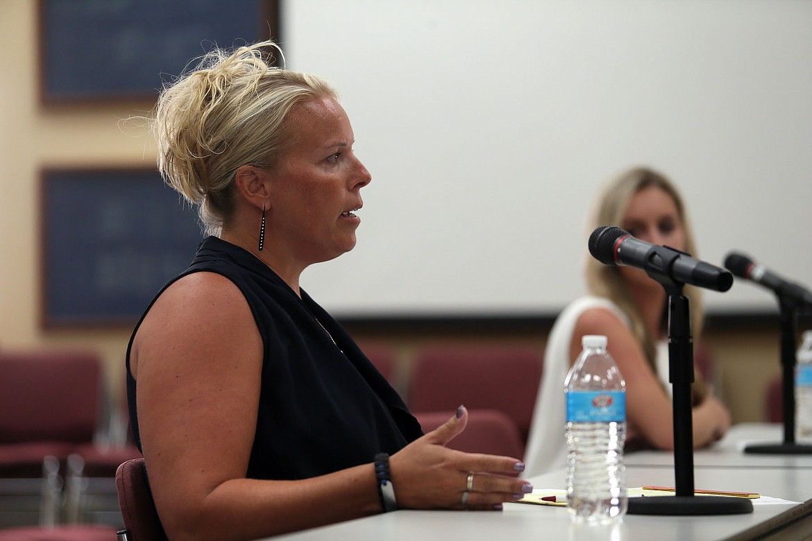 JUDD WILSON/Press
Jen Brumley answers questions from the Coeur d&#146;Alene School Board Tuesday night. Trustees later selected Brumley to serve the remainder of former trustee Dave Eubanks&#146; term, which expires in December 2021.