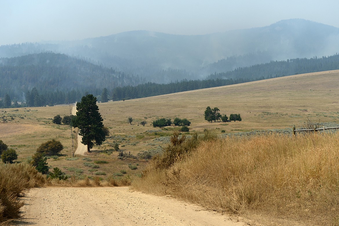 Plumes of smoke rise from the Garden Creek Fire near Hot Springs on Thursday. (Casey Kreider/Daily Inter Lake)