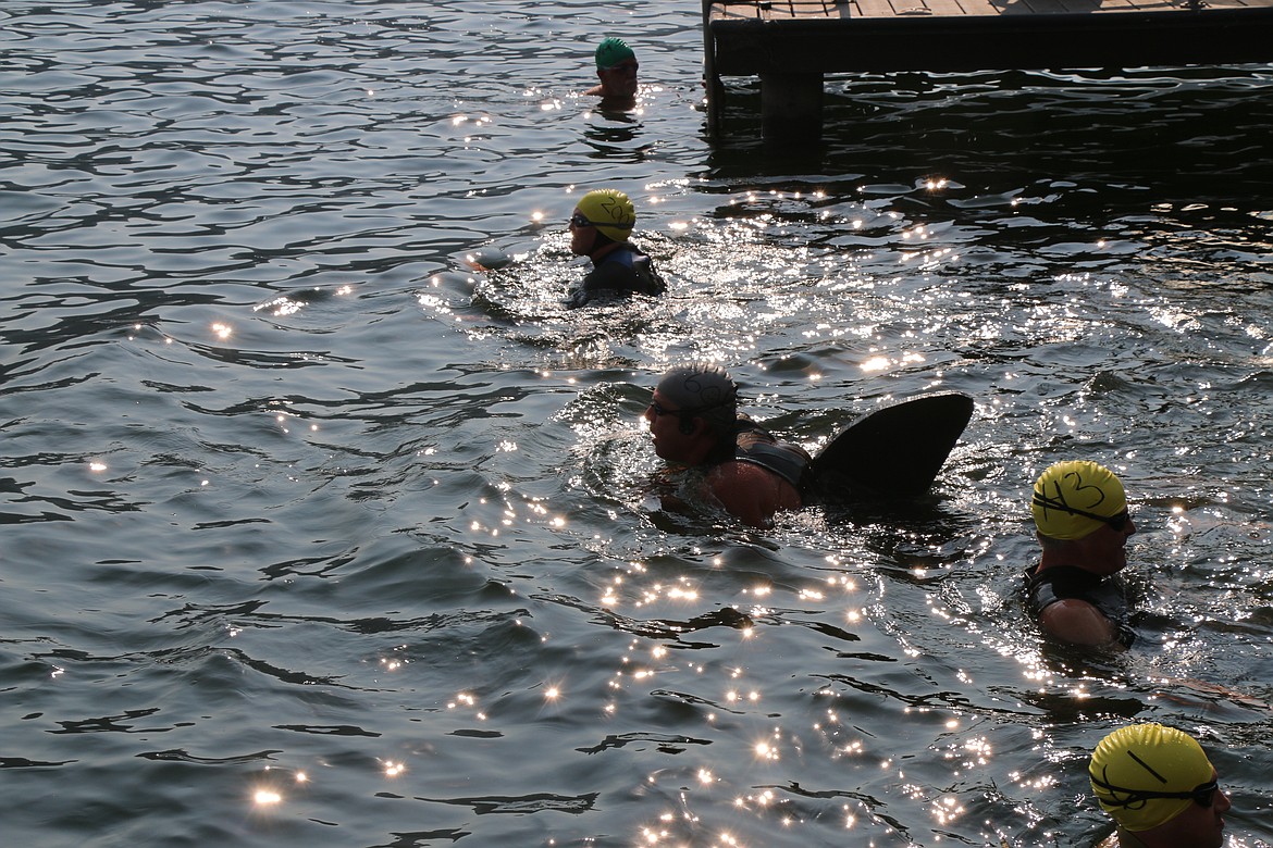 Longtime participants of the race no doubt know who this is, as local Kim Woodruff has been wearing a shark fin for the Long Bridge Swim for years.