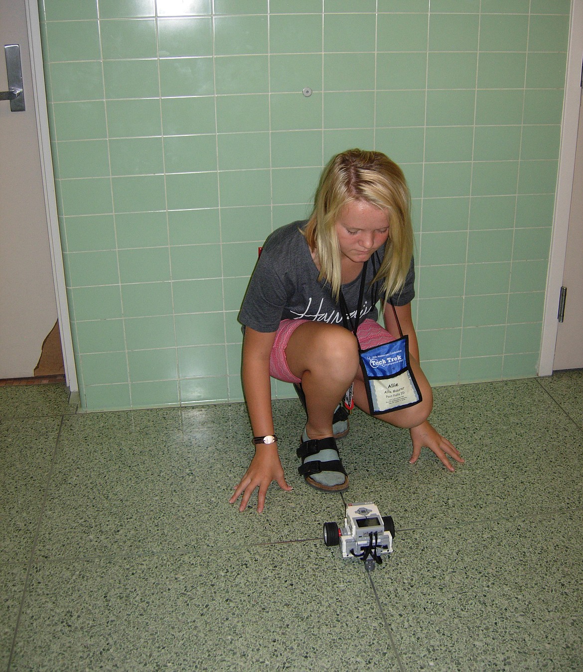 Incoming Post Falls Middle School eighth-grader Allie Maurer, 12, programs a robot to perform a line dance Thursday at Tech Trek STEM camp at Eastern Washington University in Cheney. Allie and one other North Idaho girl are among 40 female students who are spending a week at the camp exploring different sciences. The national camp is held to encourage girls to pursue science, technology, engineering and mathematics, fields that are heavily dominated by males. (Photo by BETSY McTEAR)