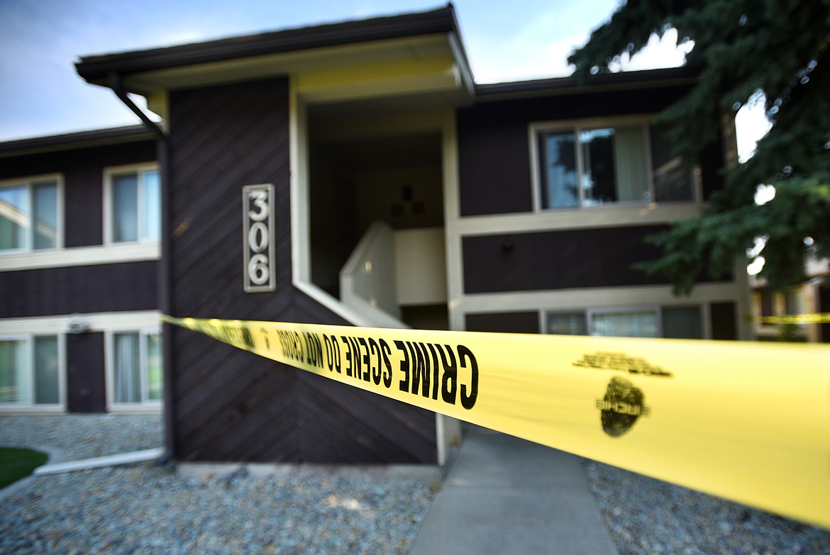 Crime scene tape surrounds an apartment at 306 Two Mile Drive on Sunday morning, August 5, in Kalispell.(Brenda Ahearn/Daily Inter Lake)