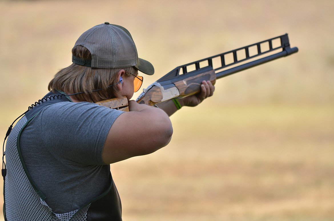 Brandon Lyons lines out his target on Trap 2 during the first round of Handicaps on Saturday. (Erin Jusseaume/ Clark Fork Valley Press)