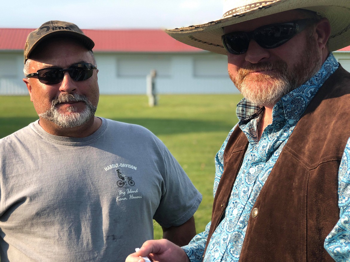 Todd Boehler talks with Calvin VonHeeder.