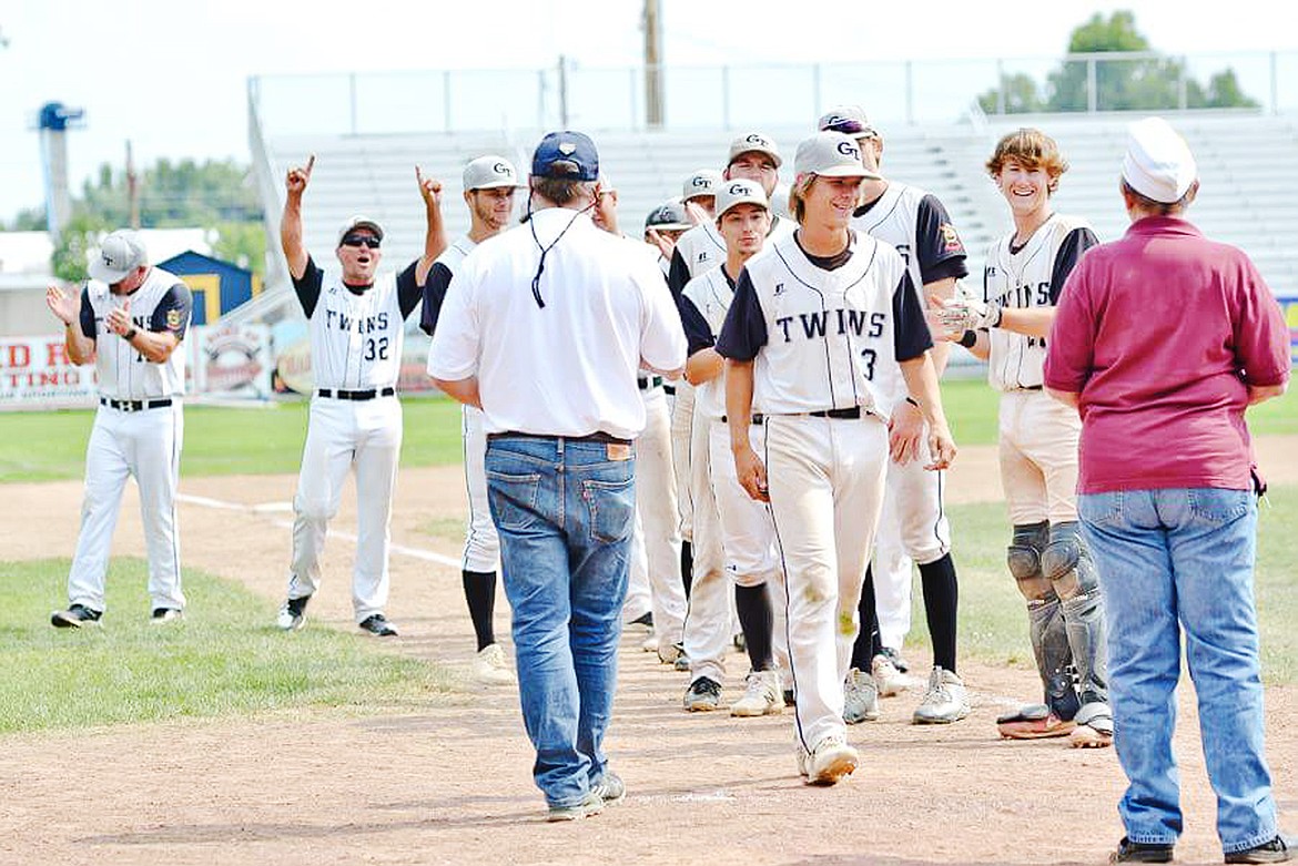 Ryan Veneman receives his MVP award after defeating the Bitterroot Red Sox 8-6 in the Montana-Alberta Class A State American Legion baseball tournament in Miles City on Sunday. (Brian Bistodeau/Heather Morrison)