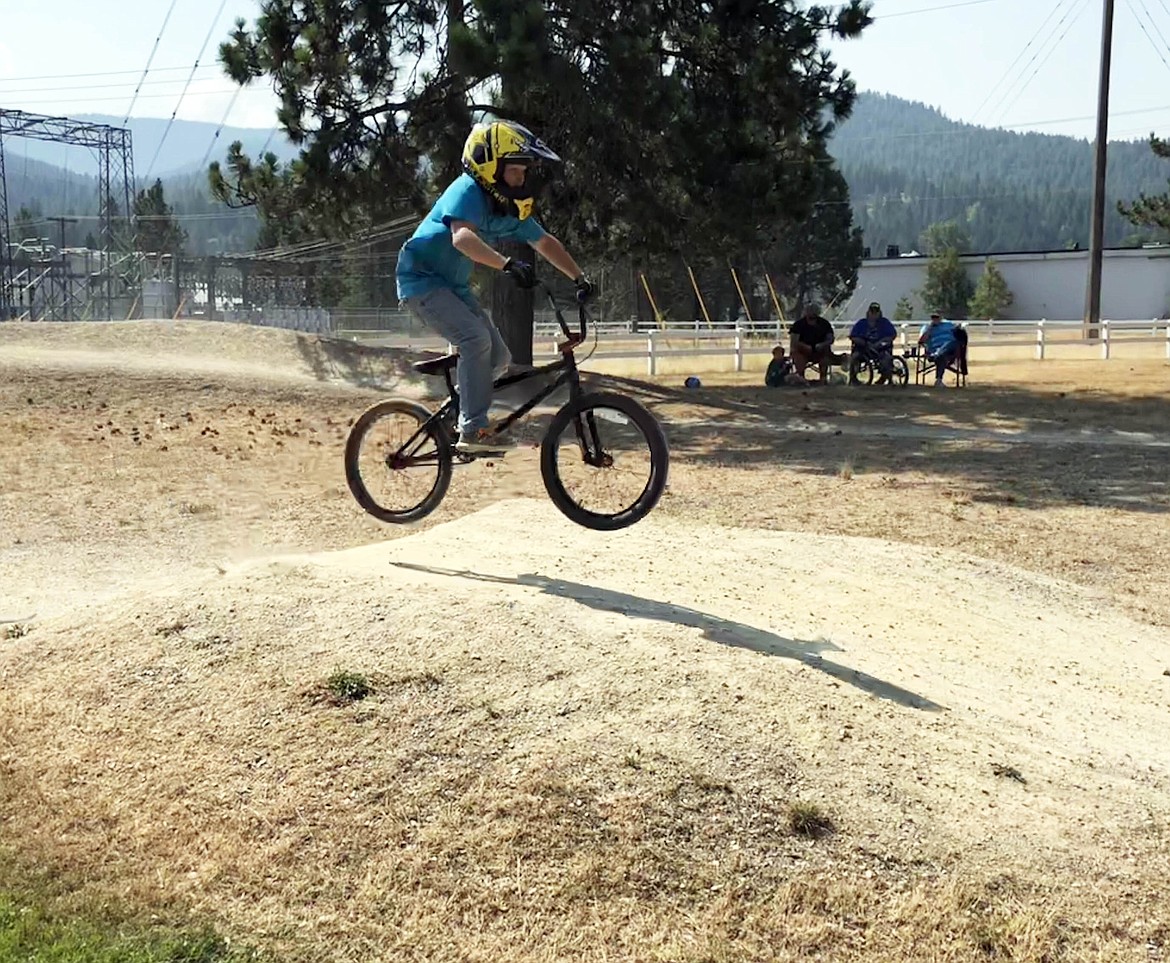 You ever take that off any sweet jumps? Jayce Haynes grabs some air during the championship round of the 10-11 age group BMX races. Haynes would go on to win the event.