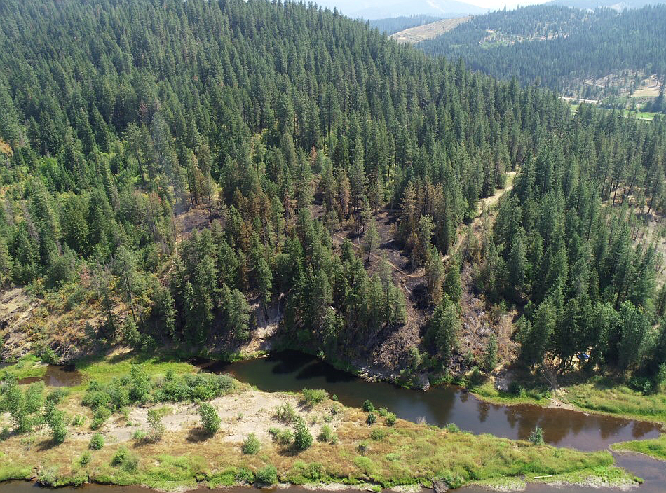 Photo by CHRIS MYERS
An Idaho Department of Lands drone surveys the fire damaged area along the river near Abbey Road.