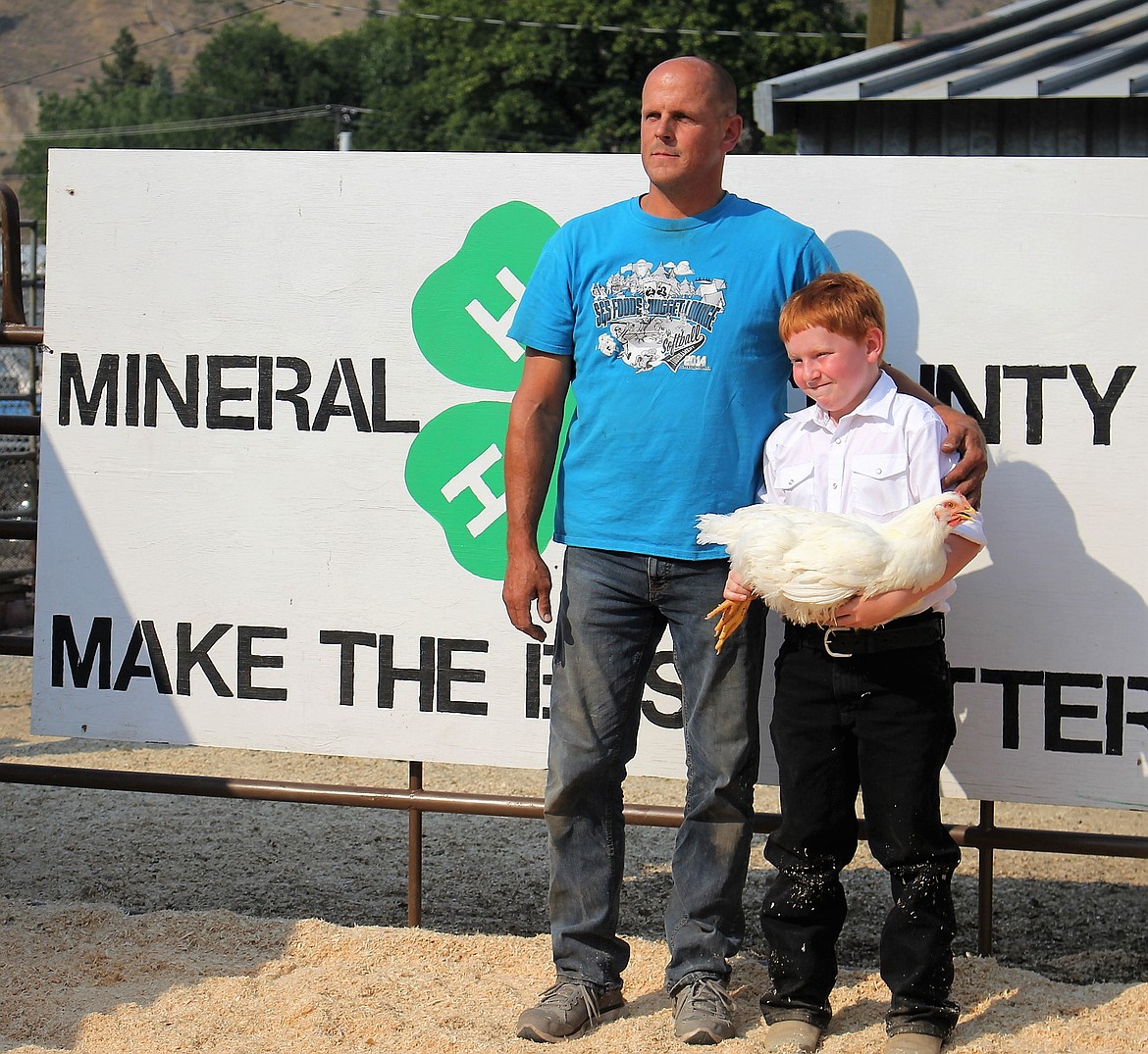 Truman Traeder raised the only chicken for the 4-H/FFA auction held on Saturday during the Mineral County Fair. NAPA Auto Store in Superior bought the purple-ribbon winner for $350.